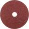 Czerwona tarcza szlifierska z otworem w środku, o teksturowanej powierzchni do prac szlifierskich. Idealna do obróbki metalu lub drewna.