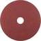 Czerwony krążek papieru ściernego o okrągłym kształcie z wycięciem pośrodku, przeznaczony do szlifowania różnych powierzchni.