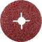 Czerwona tarcza szlifierska z szorstką, ziarnistą powierzchnią i otworem krzyżowym pośrodku. Odpowiednia do prac metalowych lub drewnianych.