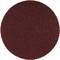 Owalny, brązowy papier ścierny o drobnoziarnistej strukturze, stosowany do wygładzania powierzchni w pracach rzemieślniczych lub przemysłowych.
