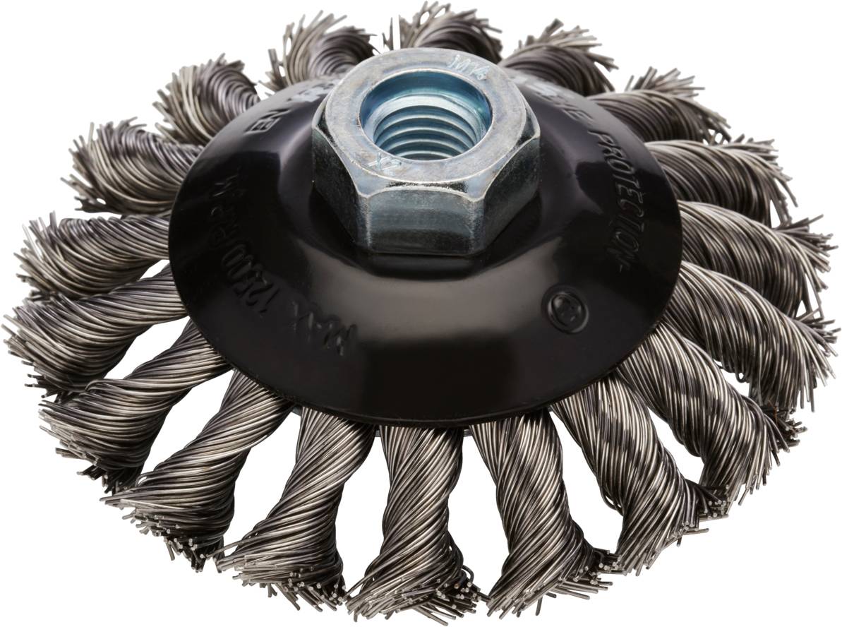 Okrągła szczotka druciana z nakrętką sześciokątną pośrodku, odpowiednia do czyszczenia i polerowania powierzchni metalowych.
