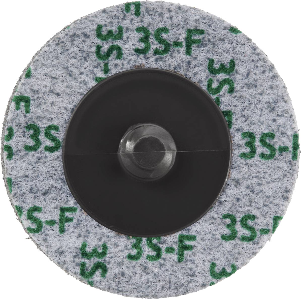 Szary element ścierny z czarnym, plastikowym środkiem, na którego powierzchni wydrukowane są zielone litery '3S-F'.