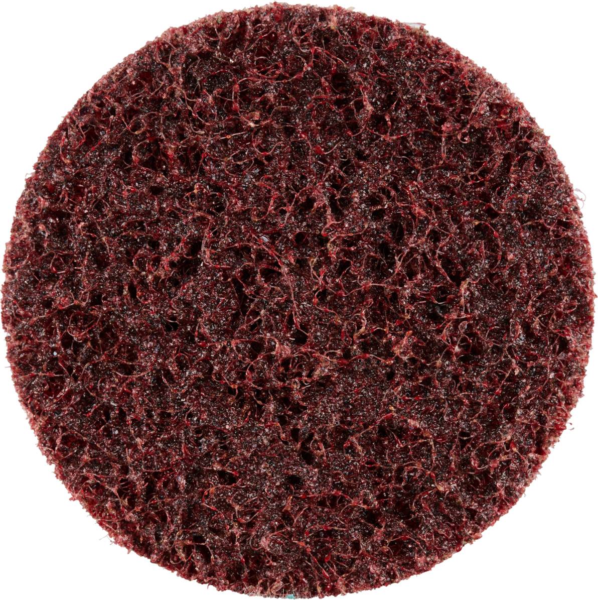 Okrągła, rudobrązowa podkładka ścierna, teksturowana i włóknista, używana do obróbki powierzchni.