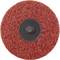 Tarcza ścierna w kolorze rdzawo-brązowym z czarnym środkiem, o teksturowanej powierzchni, przeznaczona do polerowania i szlifowania powierzchni.