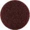 Ciemnoczerwona, okrągła gąbka ścierna o szorstkiej, włóknistej strukturze, przeznaczona do czyszczenia lub szlifowania powierzchni.
