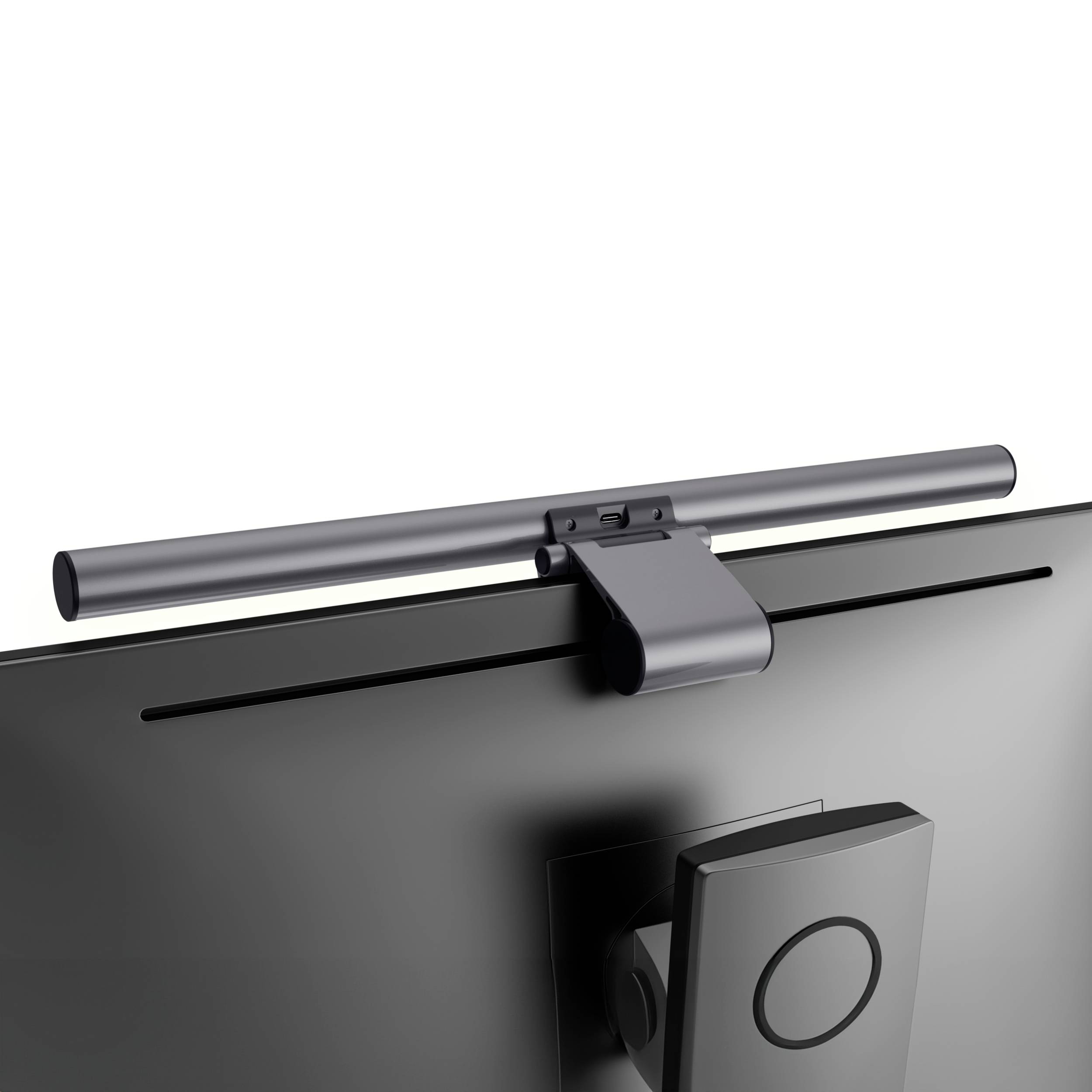 Smukła lampa monitora jest zamontowana na górze ekranu komputera i równomiernie oświetla przestrzeń roboczą.