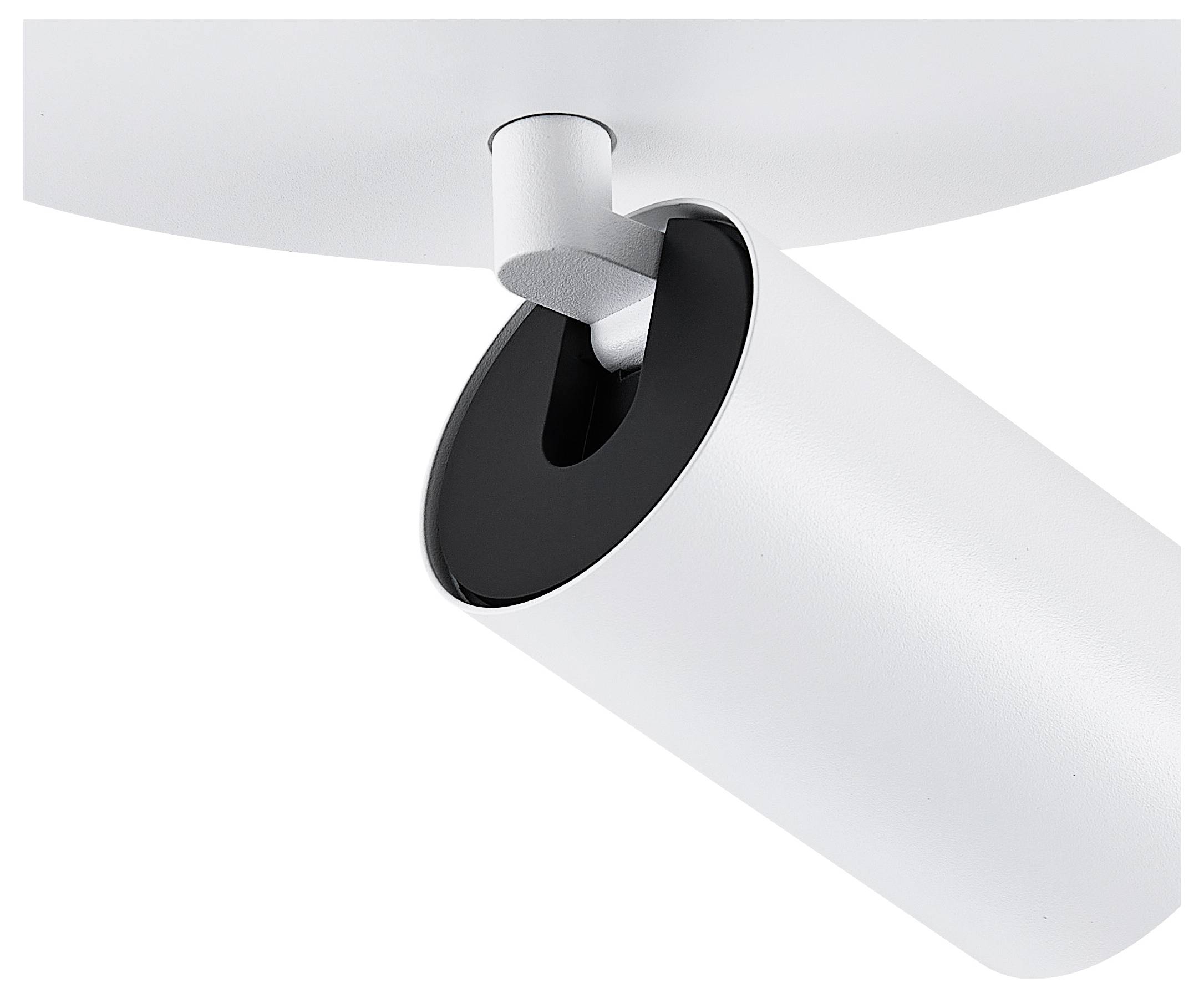 Zbliżenie nowoczesnej, cylindrycznej lampy sufitowej o czarno-białej powierzchni. Jest zamontowana na uchwycie.