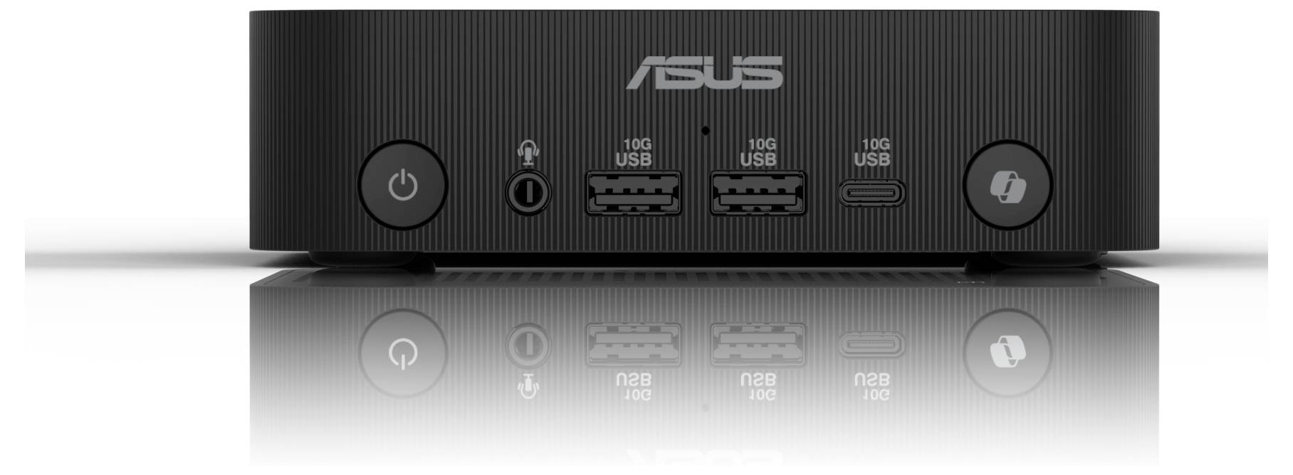 Czarna przednia ściana minikomputera ASUS z czterema portami USB i okrągłym przyciskiem zasilania po lewej stronie.