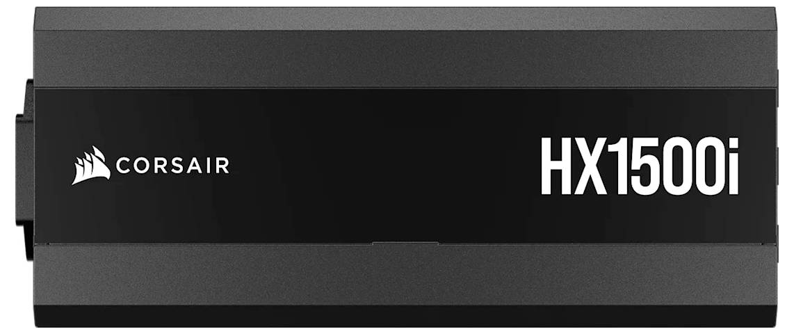 Prostokątny zasilacz komputerowy marki Corsair, model 'HX1500i', w kolorze czarnym z białym logo i napisem.