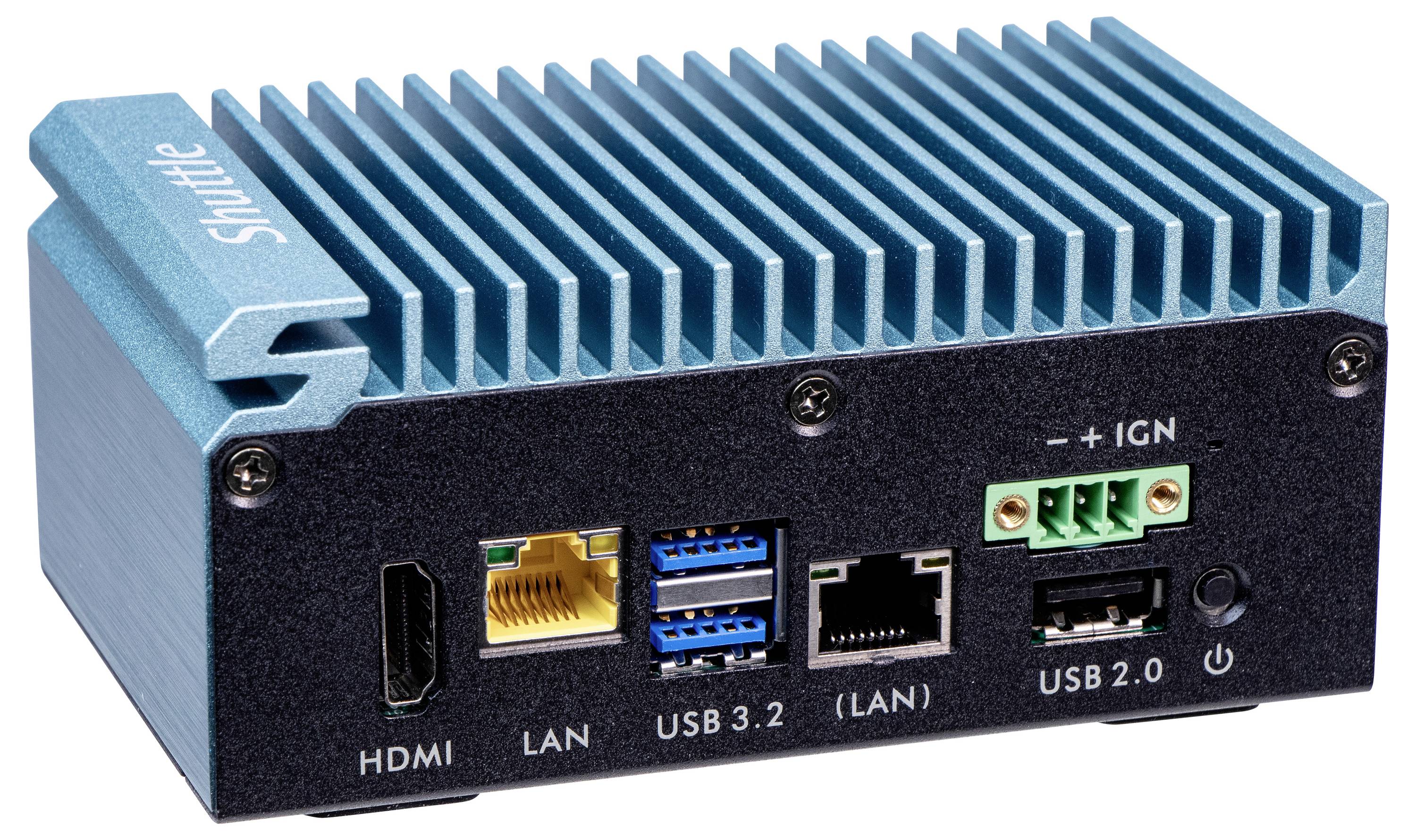 Mały, niebieski komputer z żeberkami chłodzącymi, wyposażony w liczne złącza HDMI, LAN, USB oraz zasilania na przedniej ściance.