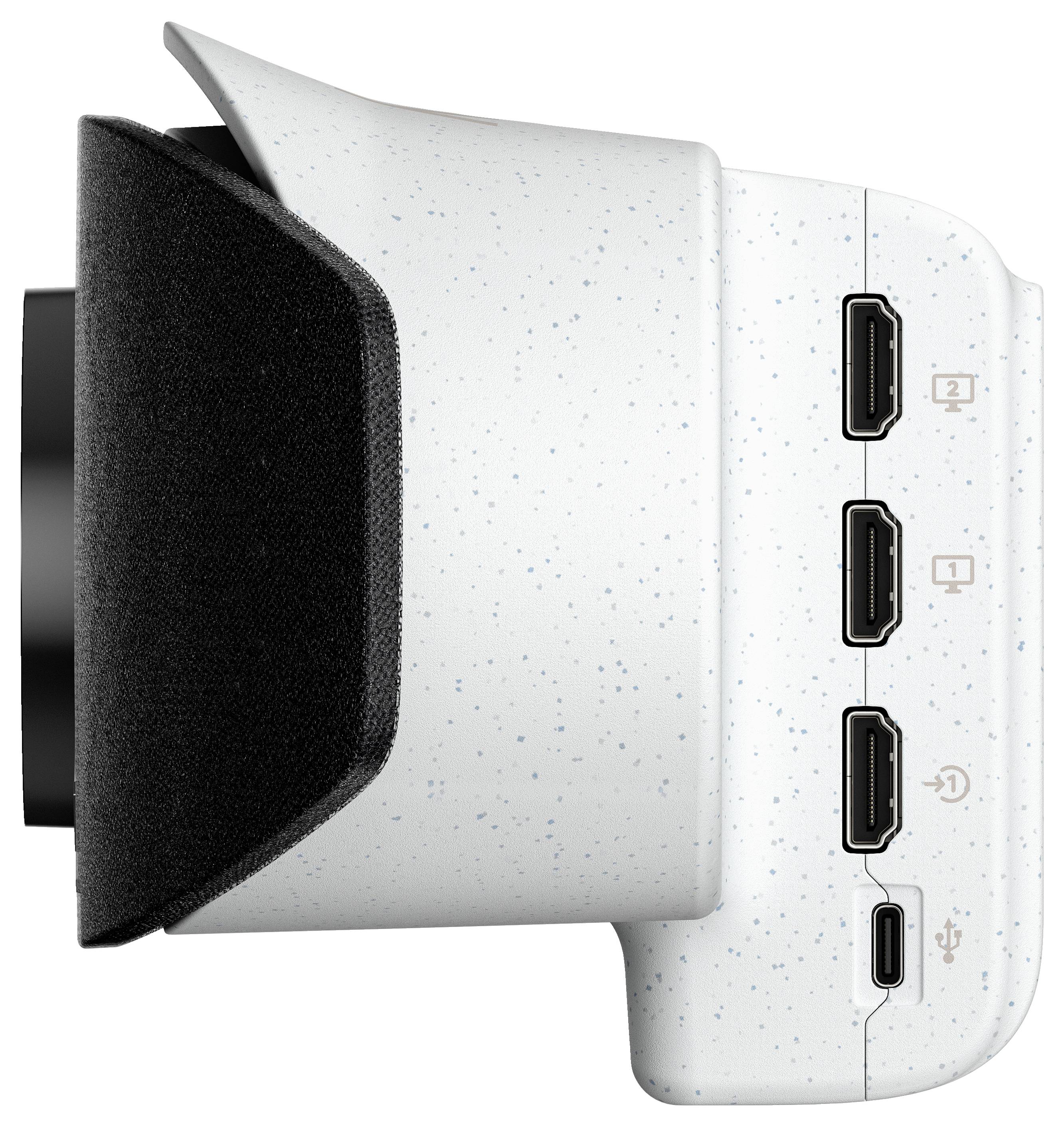 Biała kamera widziana z boku z czarnym obiektywem i czterema gniazdami przyłączeniowymi.