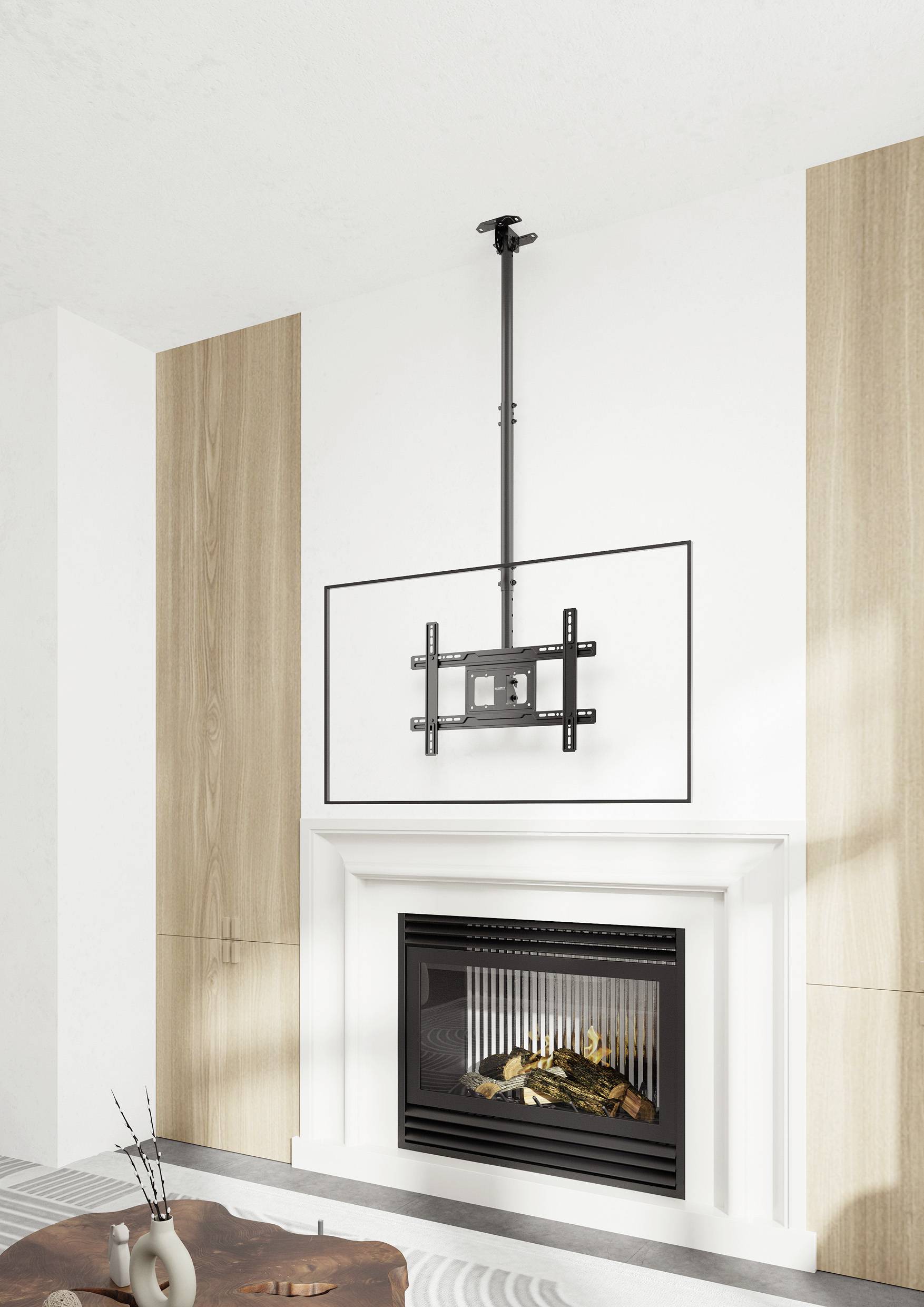 Uchwyt do telewizora zamontowany na ścianie nad nowoczesnym kominkiem z jasnymi drewnianymi panelami, z małym okrągłym drewnianym stolikiem na pierwszym planie.