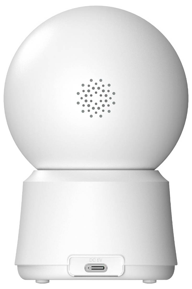 Biała, kulistego kształtu kamera bezpieczeństwa stojąca na podstawce. Z tyłu znajduje się głośnik oraz złącze zasilania prądem stałym 5V.