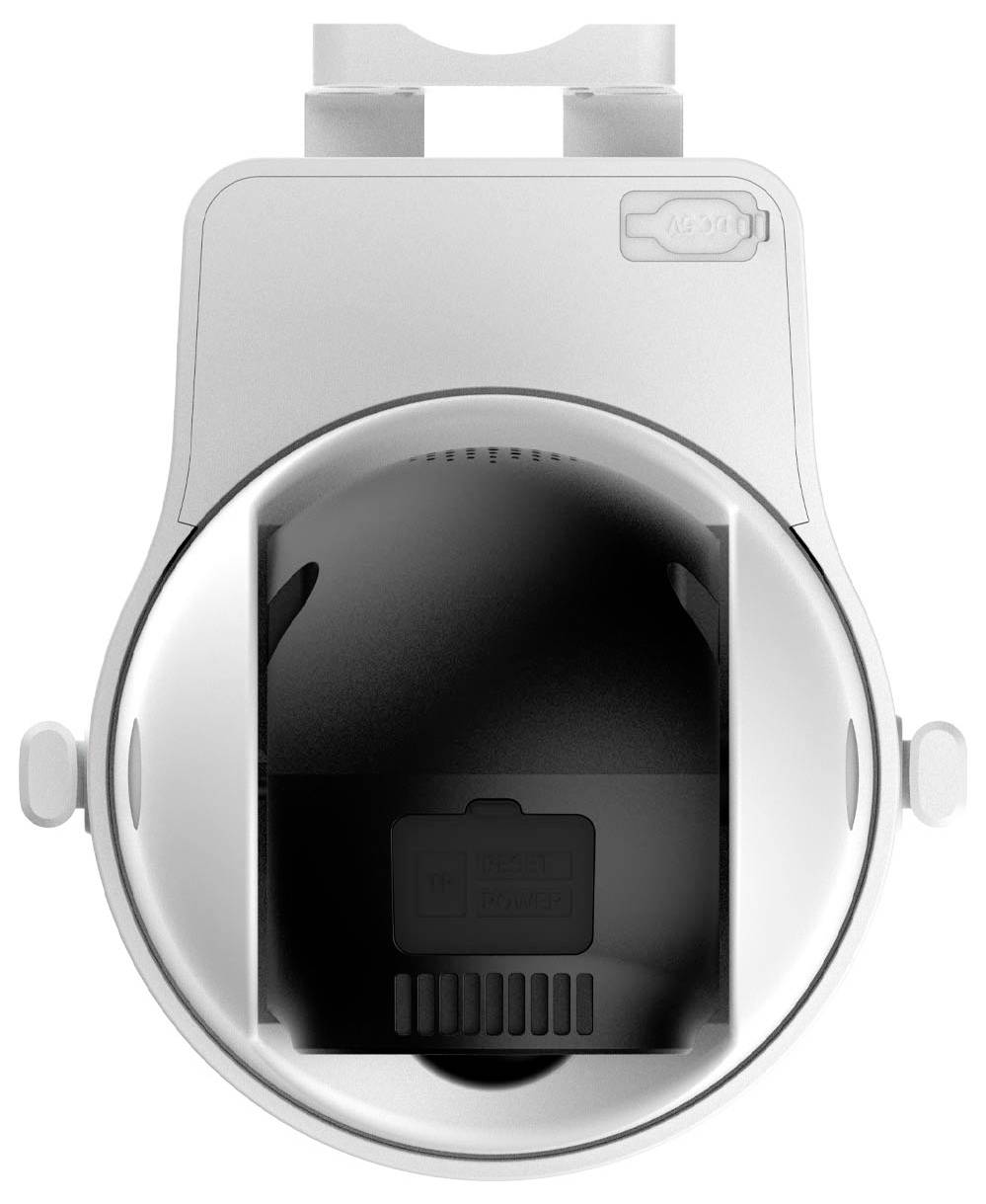 Biały, okrągły elektryczny wentylator widziany z góry, z widocznym żebrem wentylatora wewnątrz.