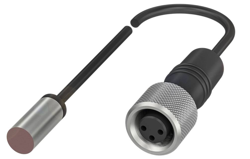 Czujnik światła z cylindryczną głowicą czujnika i złączem wtykowym, który jest używany w zastosowaniach przemysłowych.