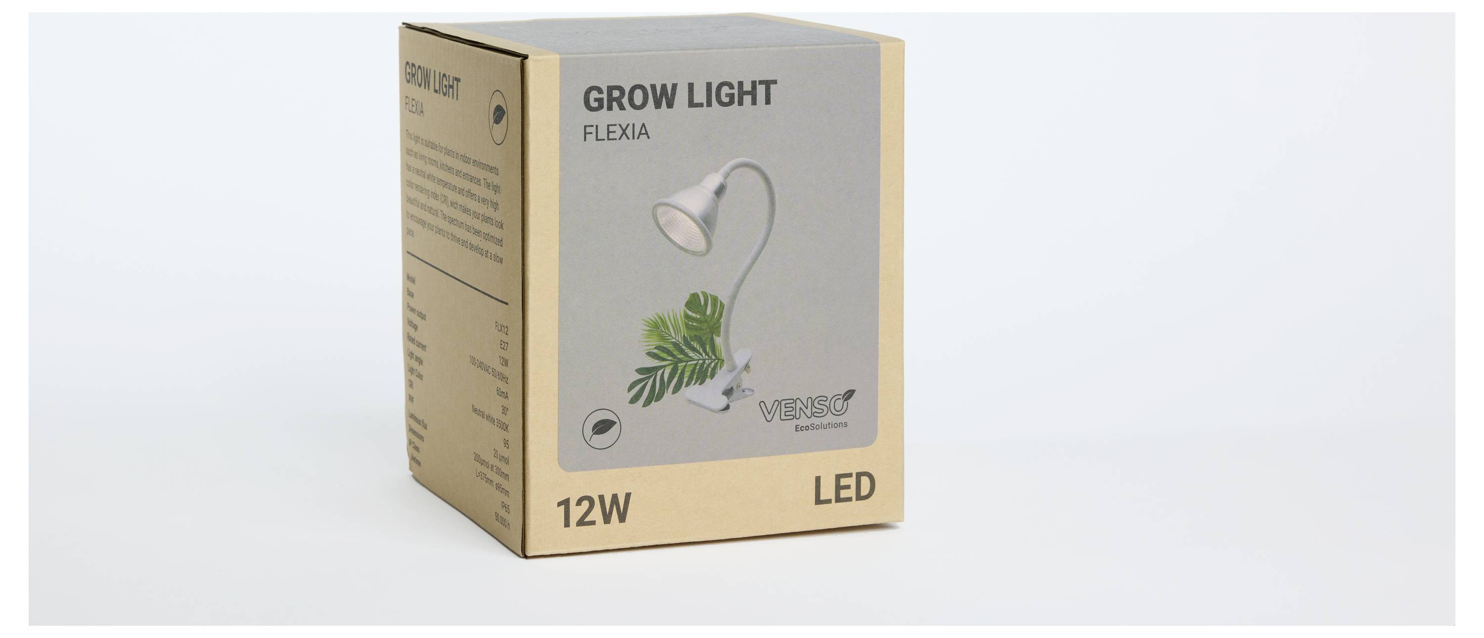Opakowanie lampy Grow Light Flexia, 12W LED, przedstawia lampę z motywem roślinnym. Odpowiednia do wzrostu roślin w pomieszczeniach zamkniętych.