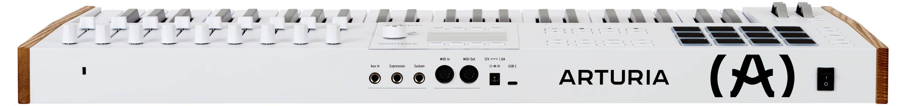 Biały kontroler MIDI z klawiszami, pokrętłami i padami, z logo 'ARTURIA' na boku.