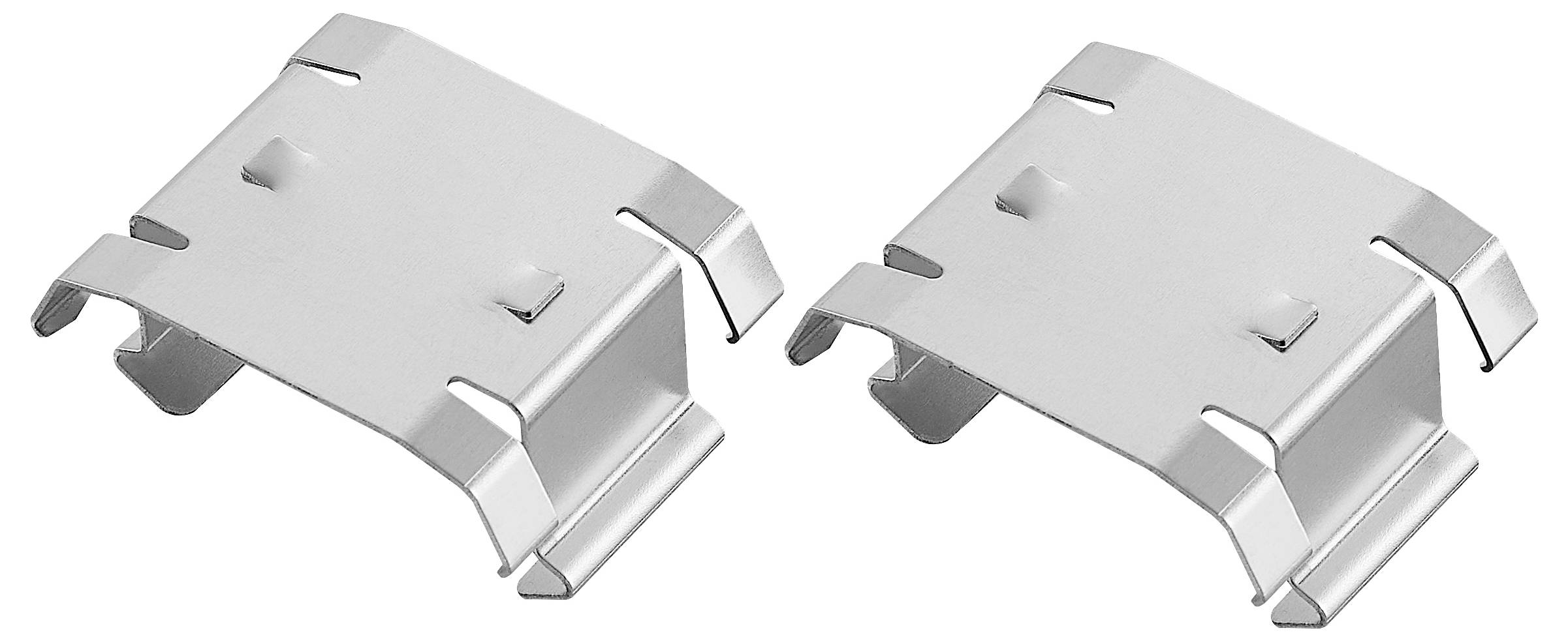 Dwa srebrne metalowe klipsy obok siebie na białym tle, używane do mocowania przedmiotów.