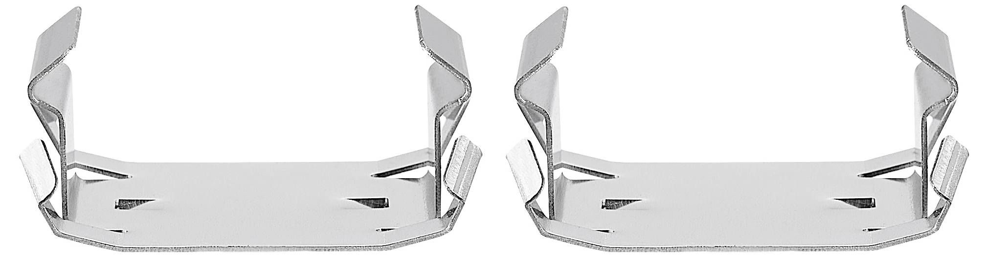 Dwa srebrne metalowe klipsy z wygiętymi końcami leżą obok siebie. Są symetryczne i odbijają światło.