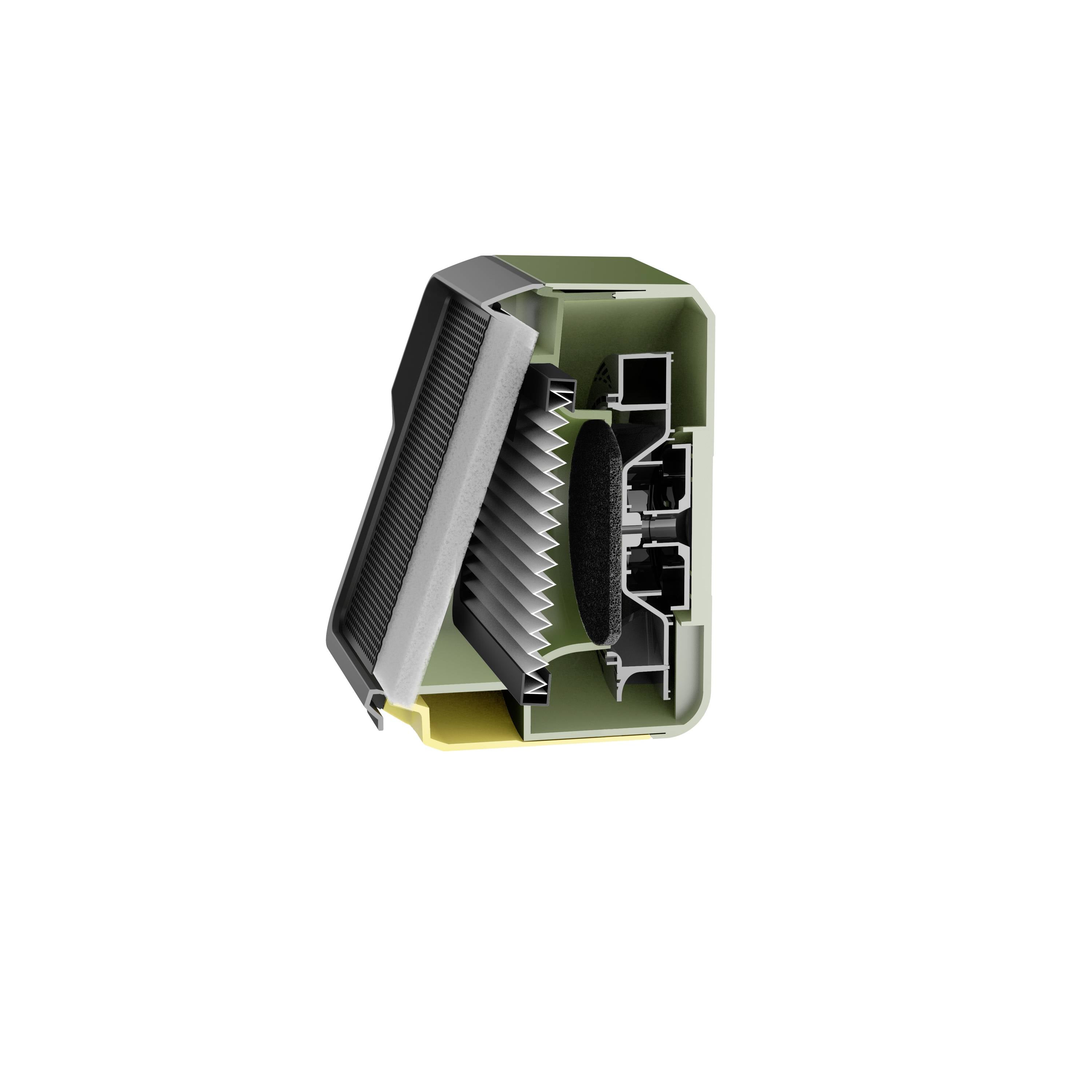 Mały zielono-czarny plastikowy przyrząd, częściowo rozebrany, ukazujący skomplikowane elementy wewnętrzne z gniazdami i złączami.