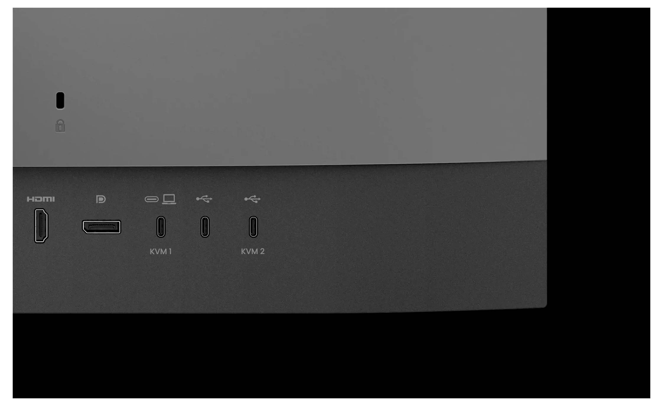 Obraz przedstawia sekcję urządzenia z różnymi portami oznaczonymi jako HDMI, DisplayPort, KVM1 i KVM2 na ciemnym tle.