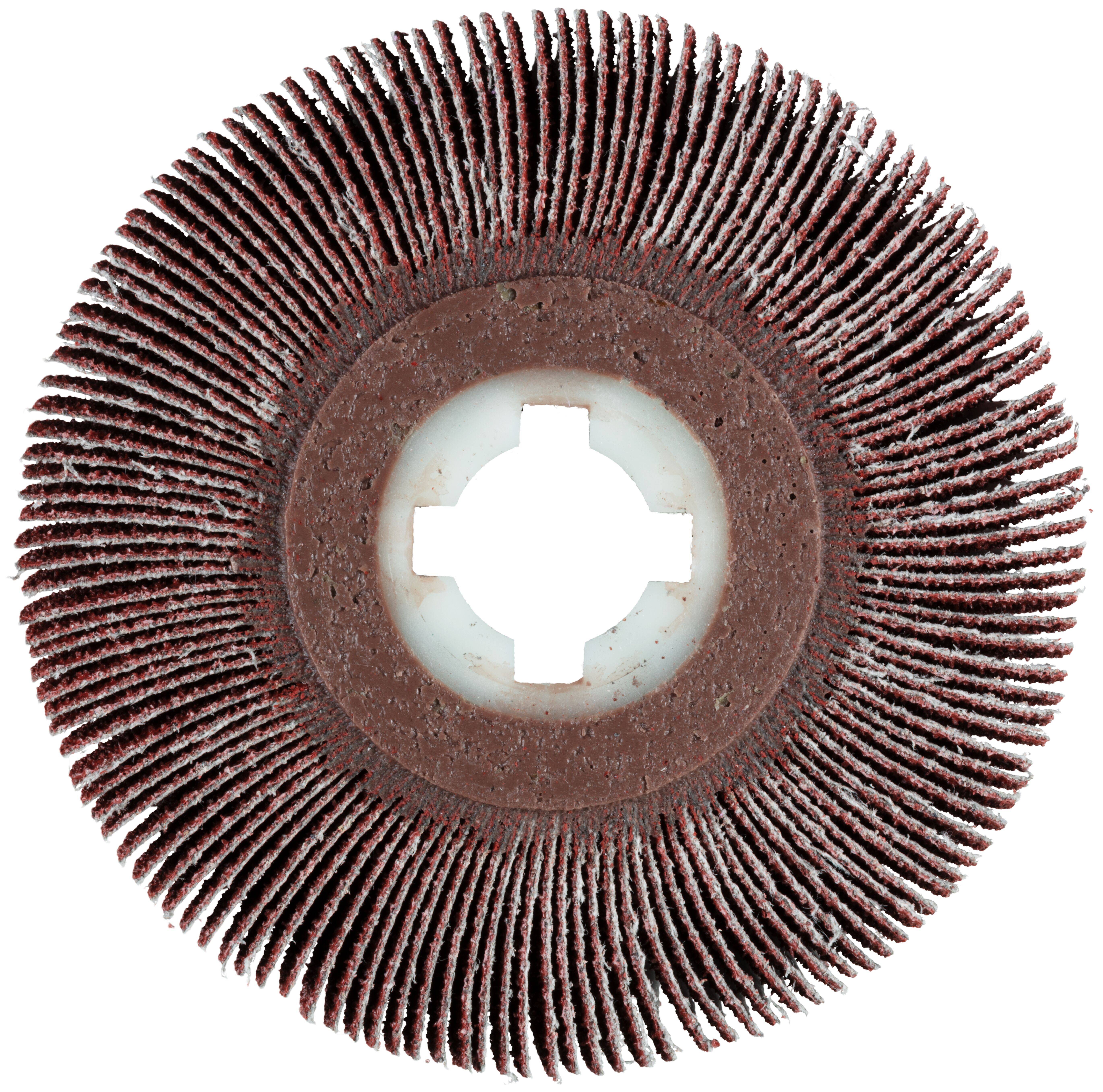 Tarcza szlifierska z elastycznymi płatkami ściernymi promieniście rozmieszczonymi wokół środka, stosowana do szlifowania lub wykańczania powierzchni w budownictwie lub przemyśle produkcyjnym.