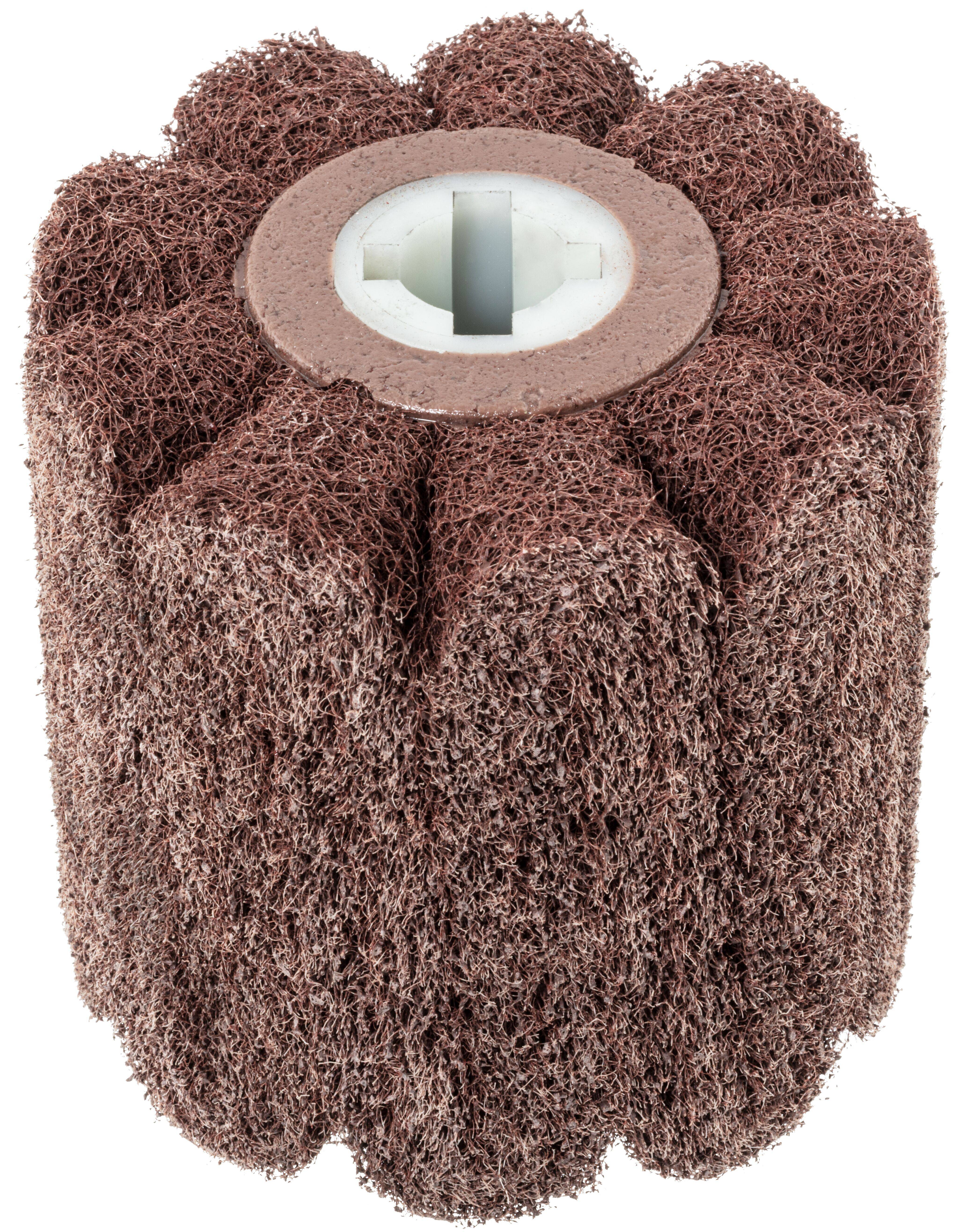 Brązowe, cylindryczne narzędzie ścierne o chropowatej powierzchni z otworem w środku, używane do polerowania lub szlifowania.