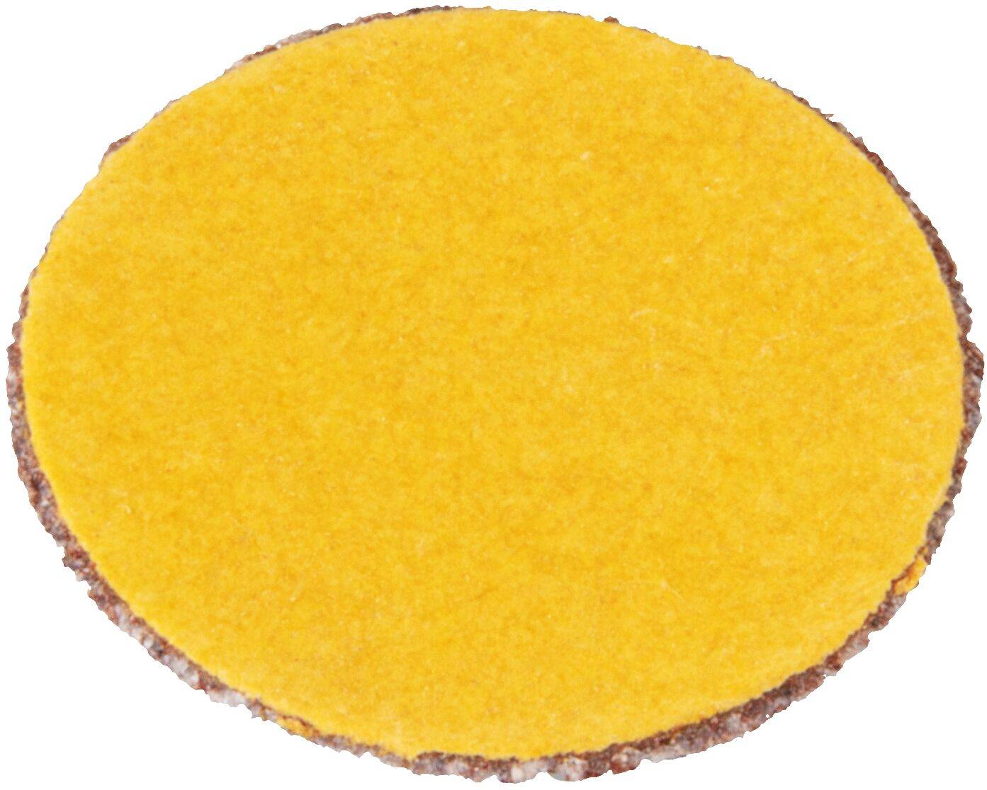 Okrągły żółty chipsy tortilla z ciemnobrązową krawędzią, prawdopodobnie o specjalnym smaku lub przyprawiony.