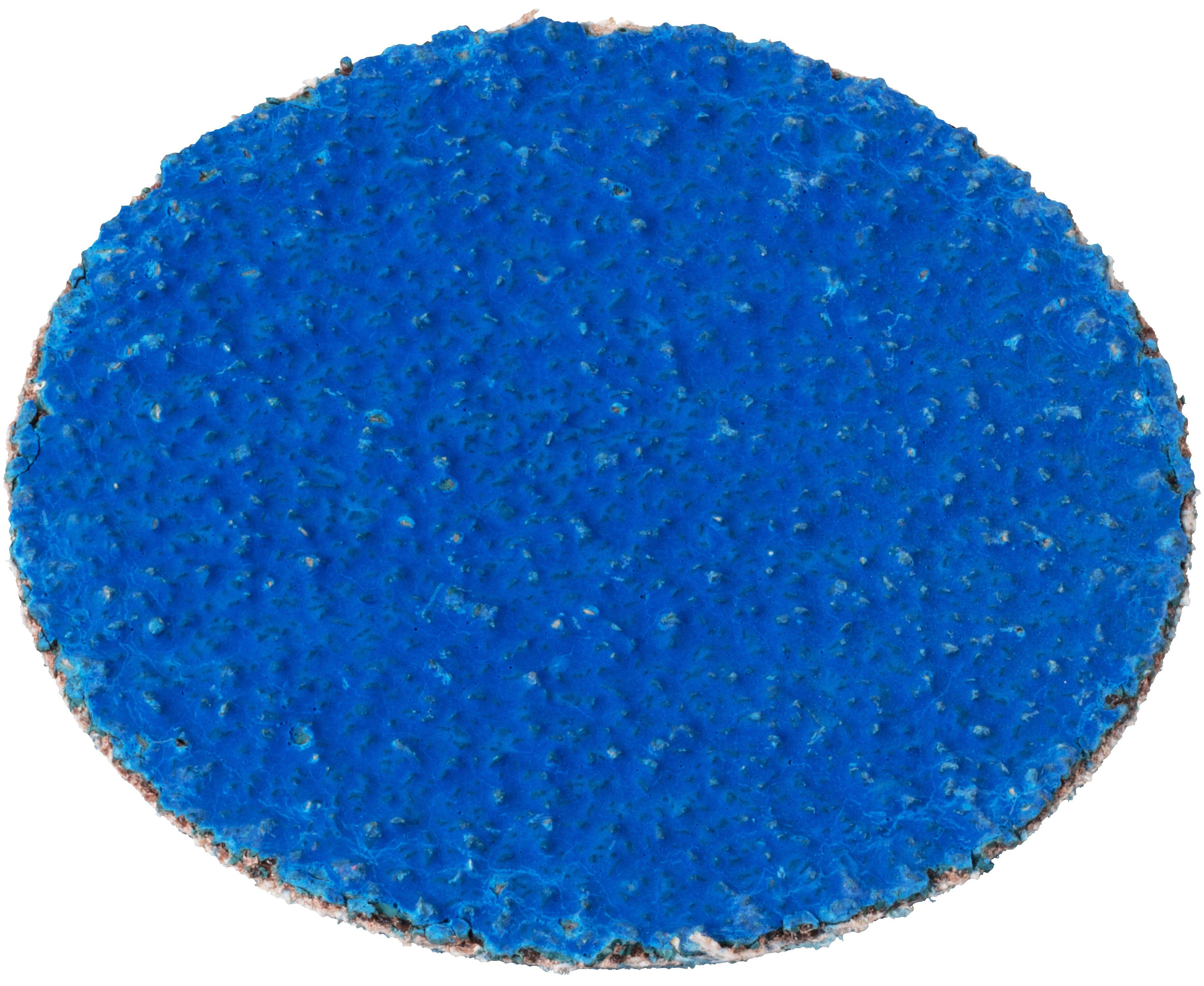 Okrągły niebieski dysk o chropowatej powierzchni, używany zazwyczaj do celów ściernych.