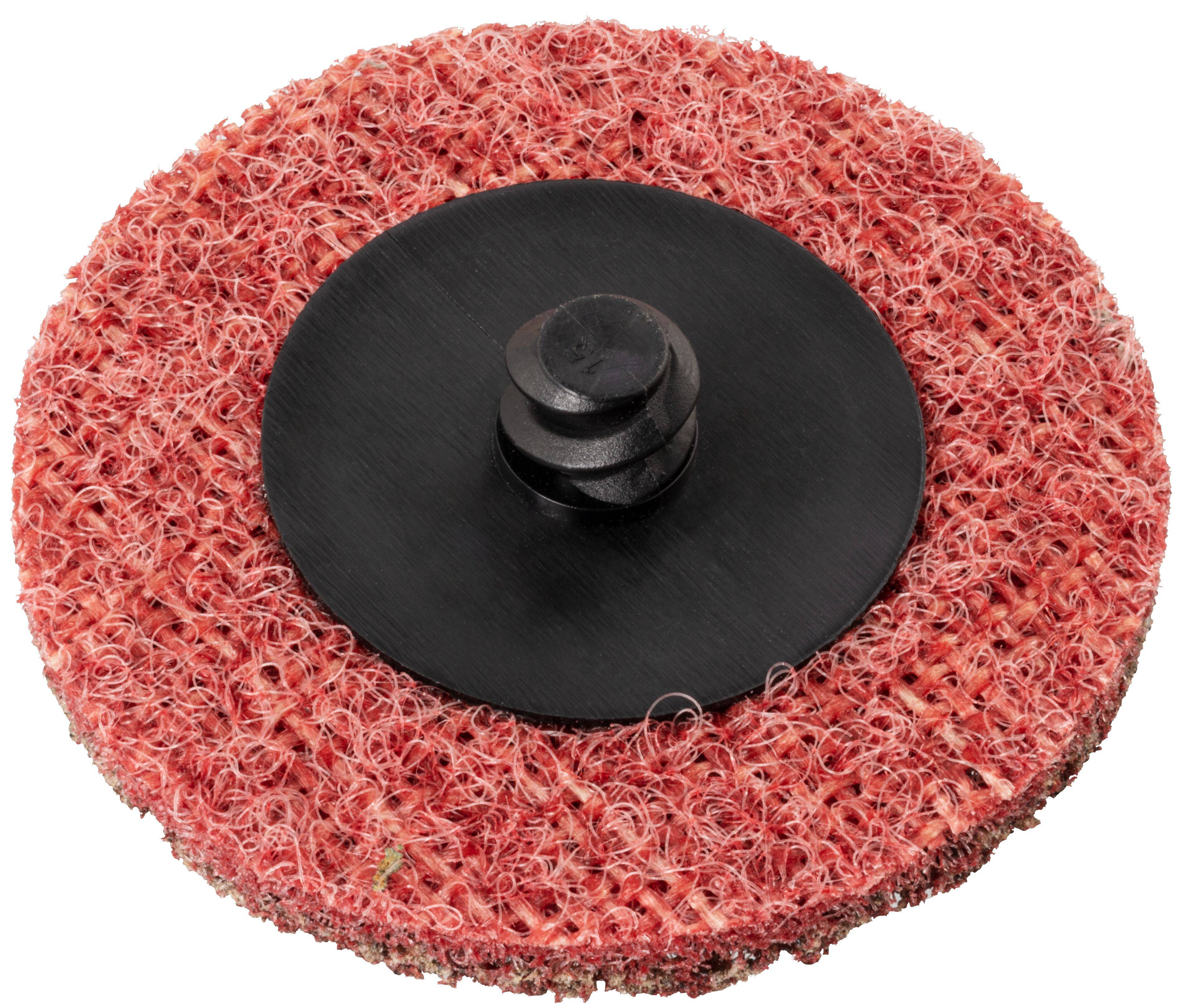Czerwona tarcza ścierna z czarnym plastikowym uchwytem pośrodku, stosowana do polerowania lub szlifowania powierzchni.
