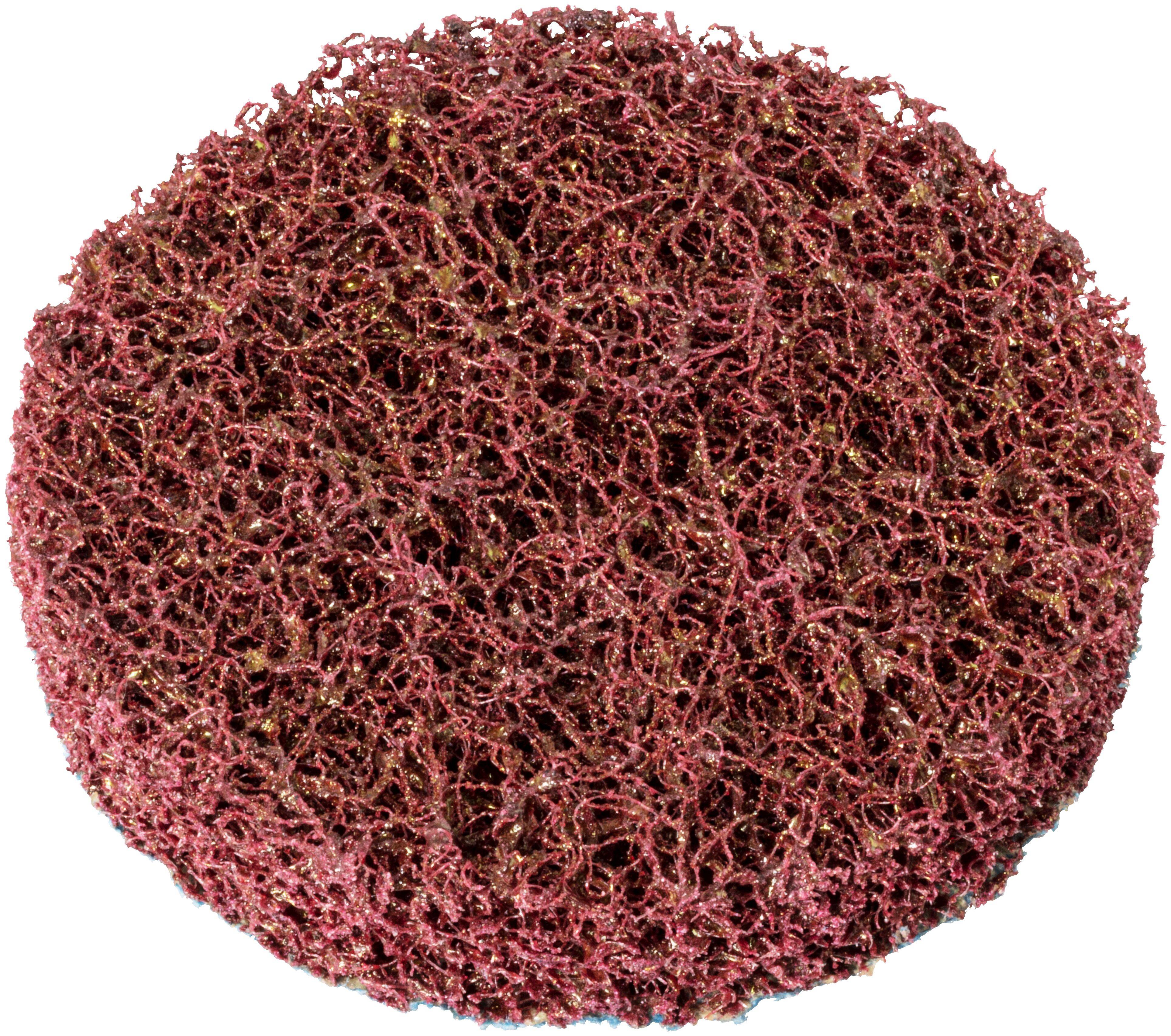 Okrągła, fakturowana gąbka czyszcząca w kolorze bordowym, o porowatej i skomplikowanej powierzchni, przeznaczona do sprzątania.