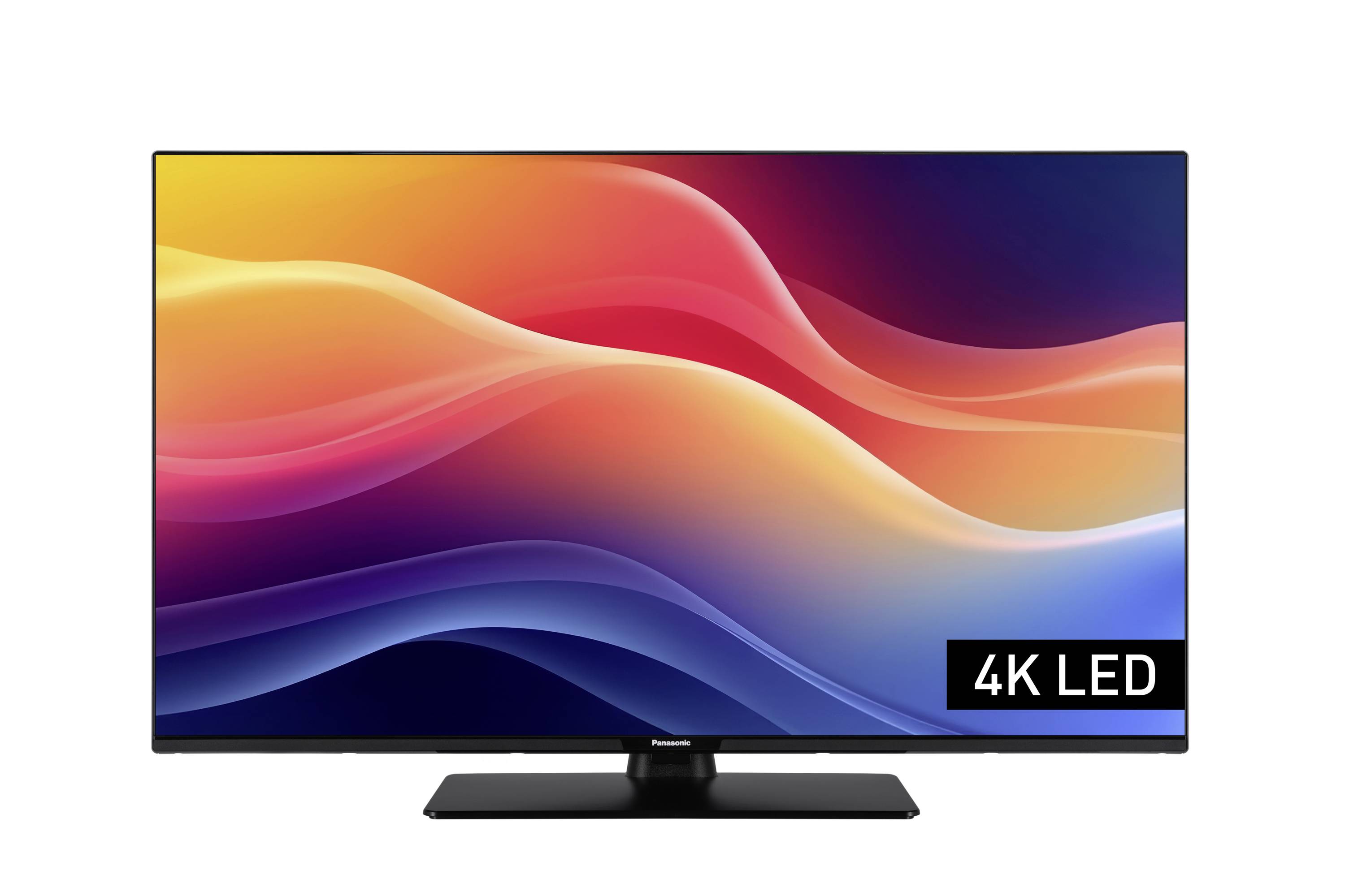 Duży telewizor z płaskim ekranem wyświetlający żywy abstrakcyjny wzór czerwonych, pomarańczowych i niebieskich fal z napisem '4K LED' w dolnym prawym rogu.
