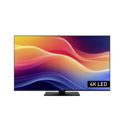 Na eleganckim, nowoczesnym telewizorze wyświetlają się żywe, kolorowe fale, a w rogu widnieje napis '4K LED', sugerujący wysoką jakość obrazu.