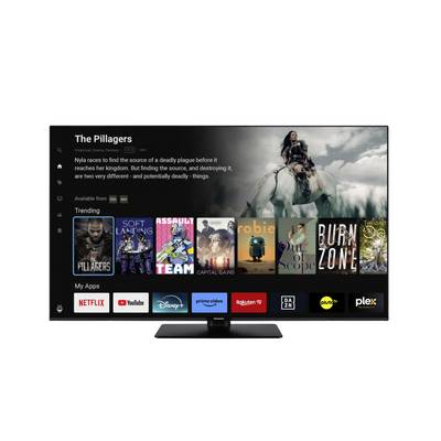Telewizor wyświetlający interfejs streamingowy z filmem zatytułowanym 'Złodzieje' oraz różnymi ikonami aplikacji, takimi jak Netflix, YouTube i Disney+.