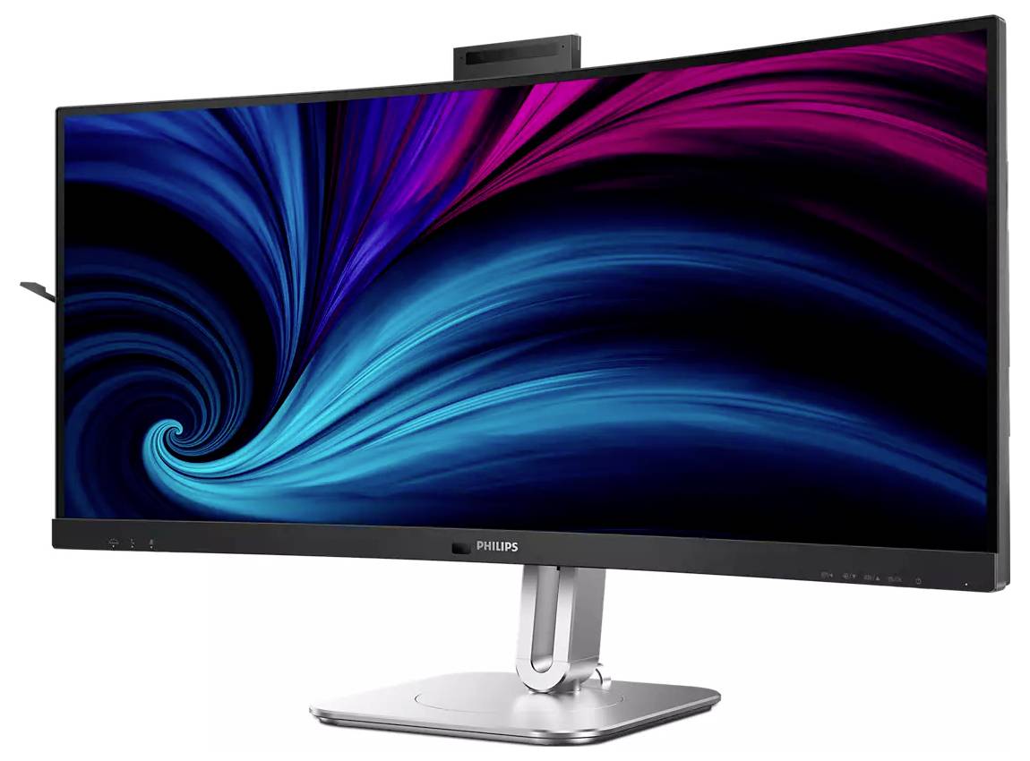 Monitor ultrawide wyświetlający żywy, abstrakcyjny wzór wirowy w kolorach niebieskim i różowym, zamontowany na srebrnym stojaku z szeroką podstawą.