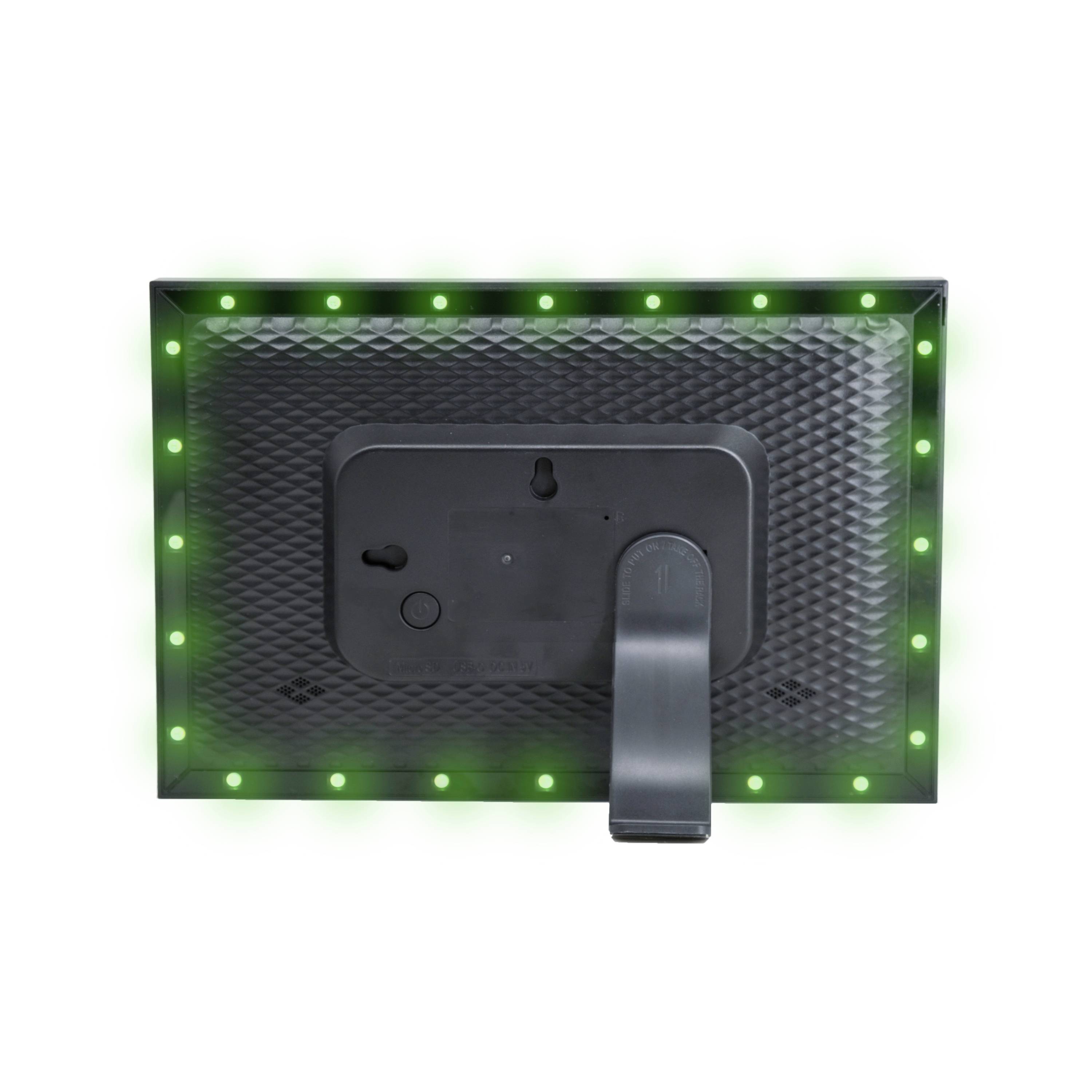 Obraz przedstawia tył urządzenia cyfrowego o prostokątnym kształcie z podstawką. Zielone diody LED obramowują boki, sygnalizując włączenie zasilania.