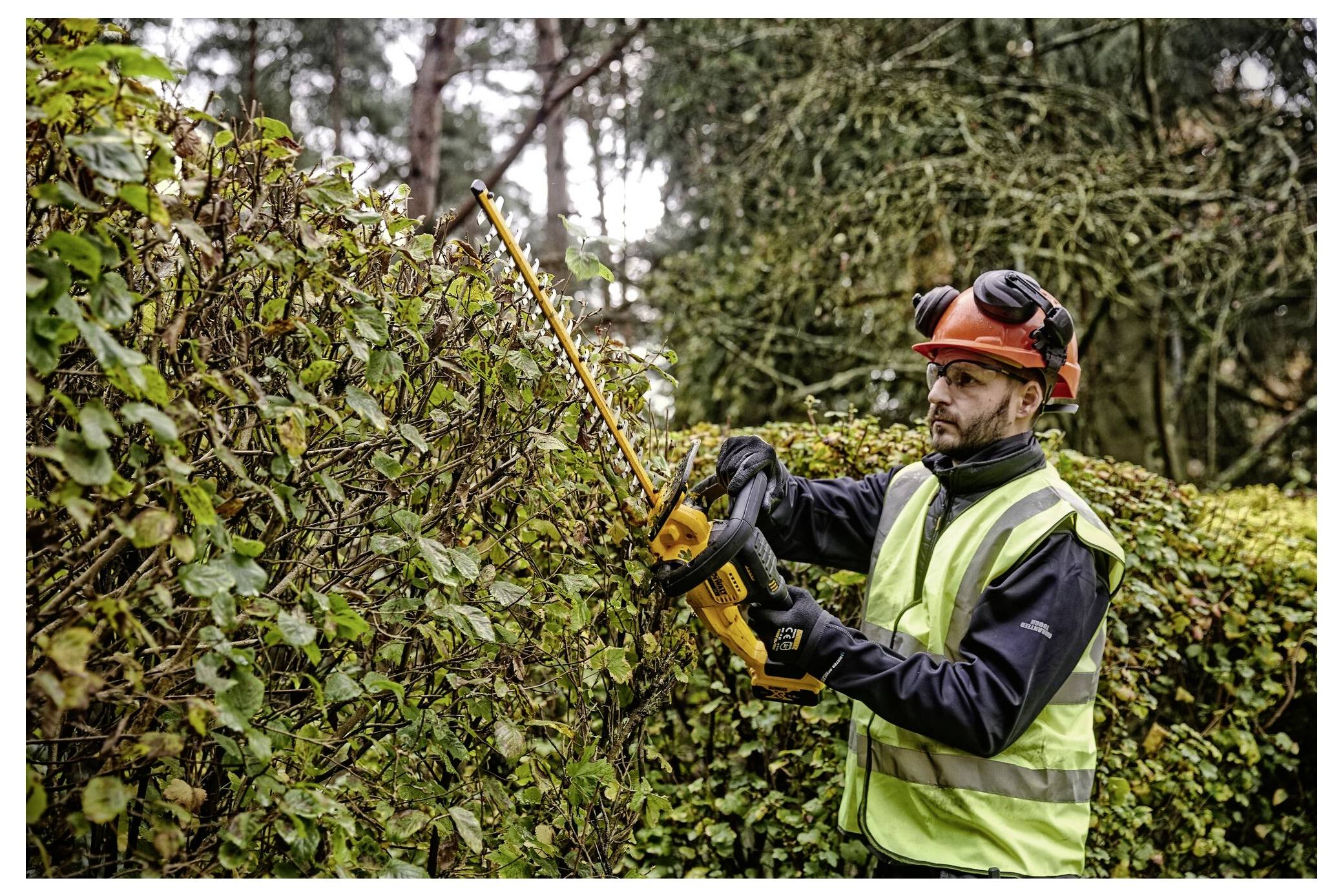 Акумуляторний тример для живоплоту DEWALT 18V Lithium 550 мм