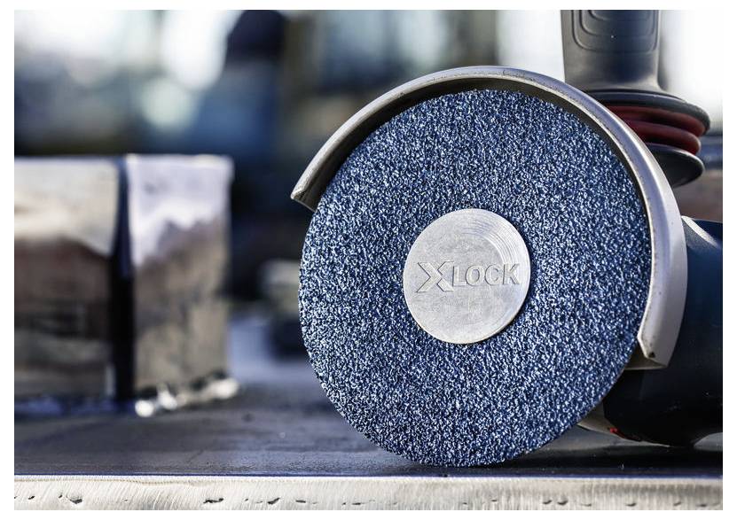 Zbliżenie niebieskiej, teksturowanej tarczy szlifierskiej z napisem 'Lock', koncentrujące się na powierzchni i szczegółach narzędzia.