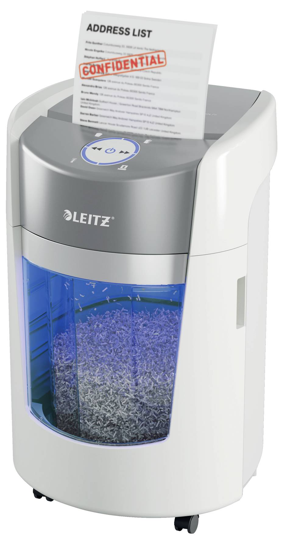 Niszczarka w użyciu podczas niszczenia poufnego dokumentu. Dokument zatytułowany 'LISTA ADRESÓW' opatrzony jest pieczęcią 'POUFNE'.