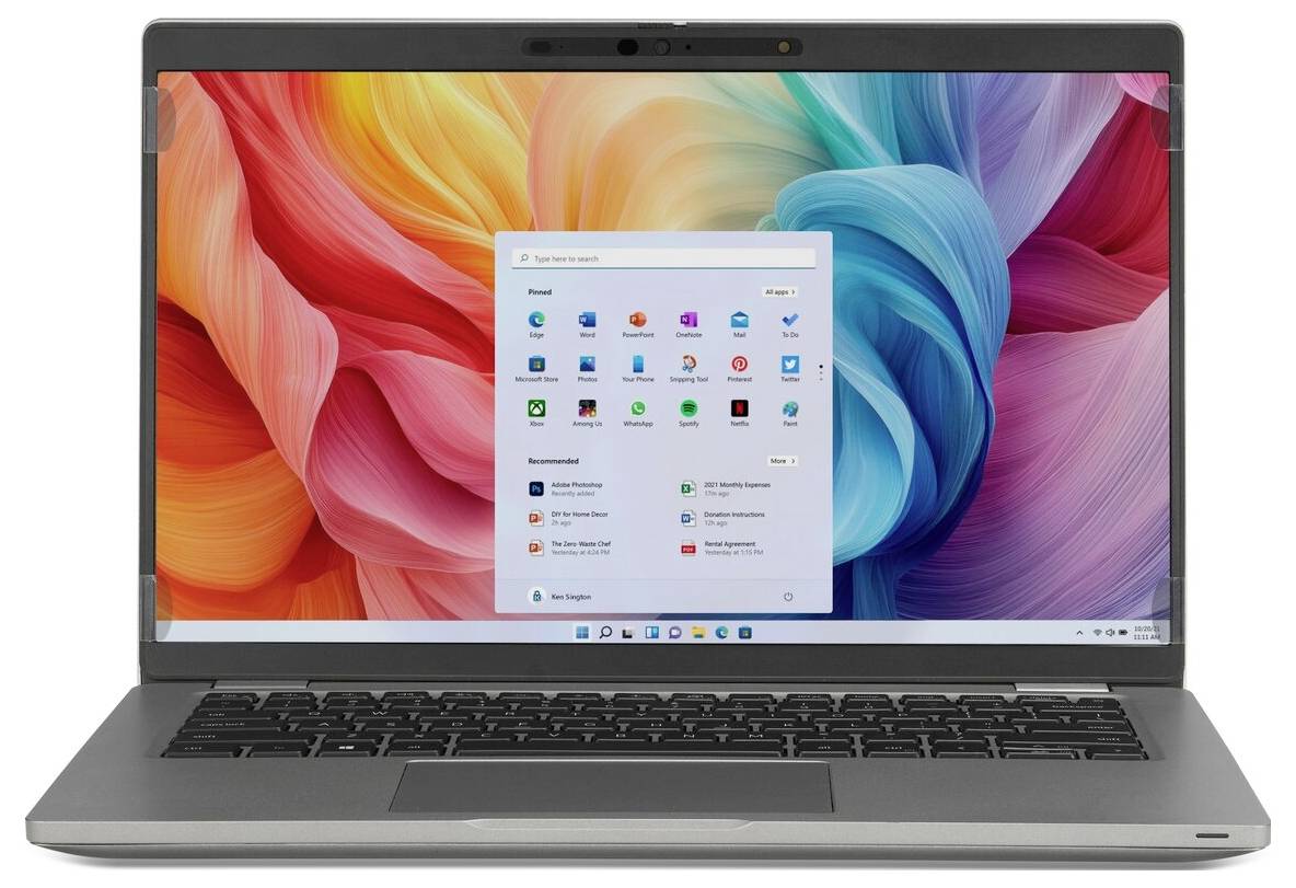 Laptop wyświetla kolorową abstrakcyjną tapetę z otwartym menu Start systemu Windows, na którym widoczne są różne ikony aplikacji.