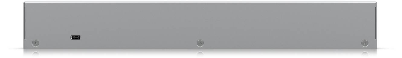 Szary prostokątny elektroniczny urządzenie widziane z przodu, z małym portem po lewej stronie.