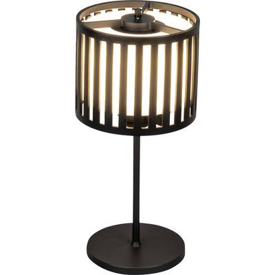 Nowoczesna czarna lampa stołowa z cylindrycznym kloszem, posiadająca pionowe wycięcia, które pozwalają światłu przeświecać w postaci pasków.