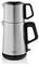 Elektryczny czajnik ze stali nierdzewnej o nowoczesnym designie, z górną częścią do zaparzania herbaty i dolną komorą na wodę, wyposażony w czarne uchwyty.