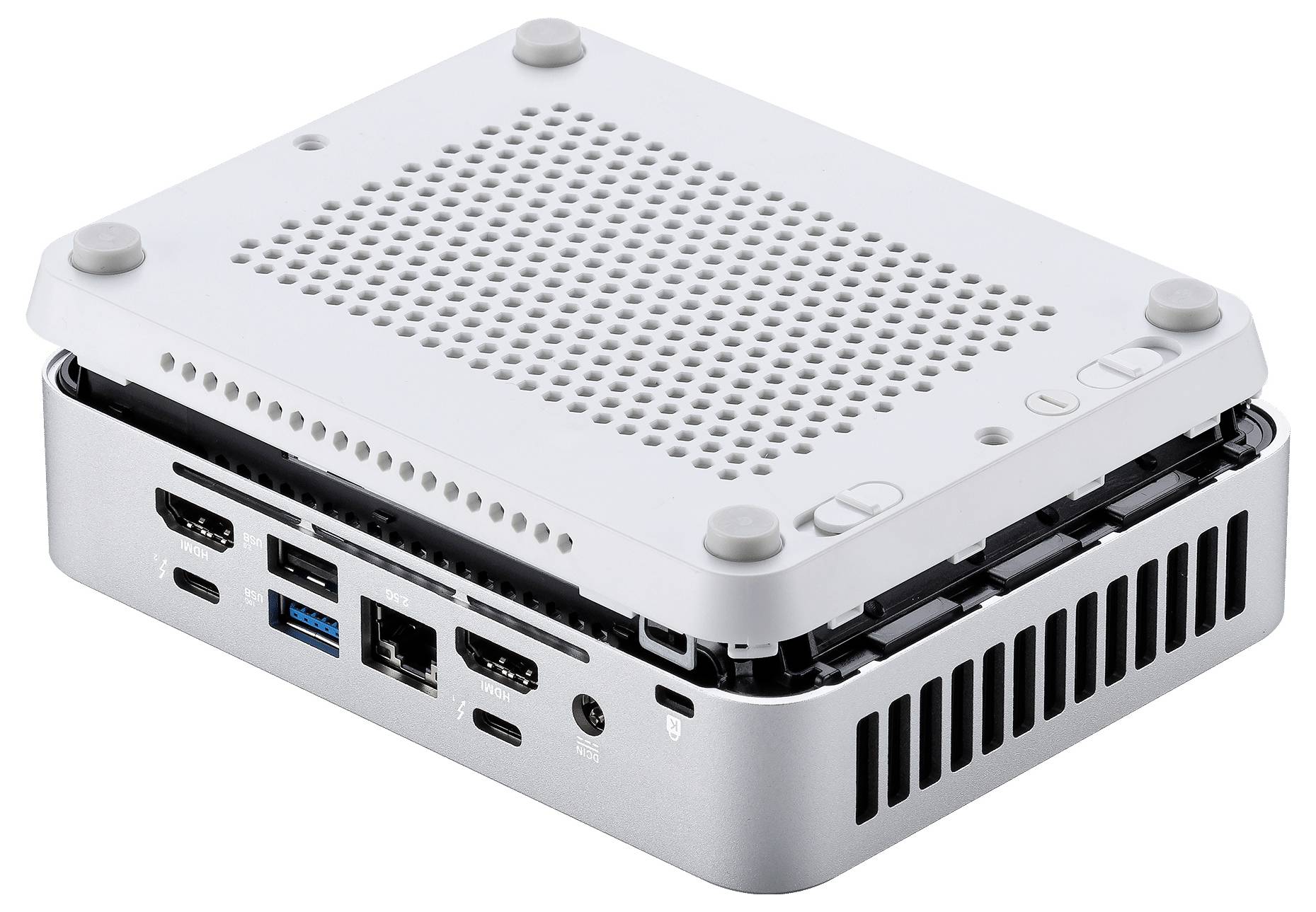 Kompaktowe urządzenie komputerowe z perforowaną górną częścią do wentylacji. Posiada różne porty, w tym HDMI, USB i Ethernet do łączności.