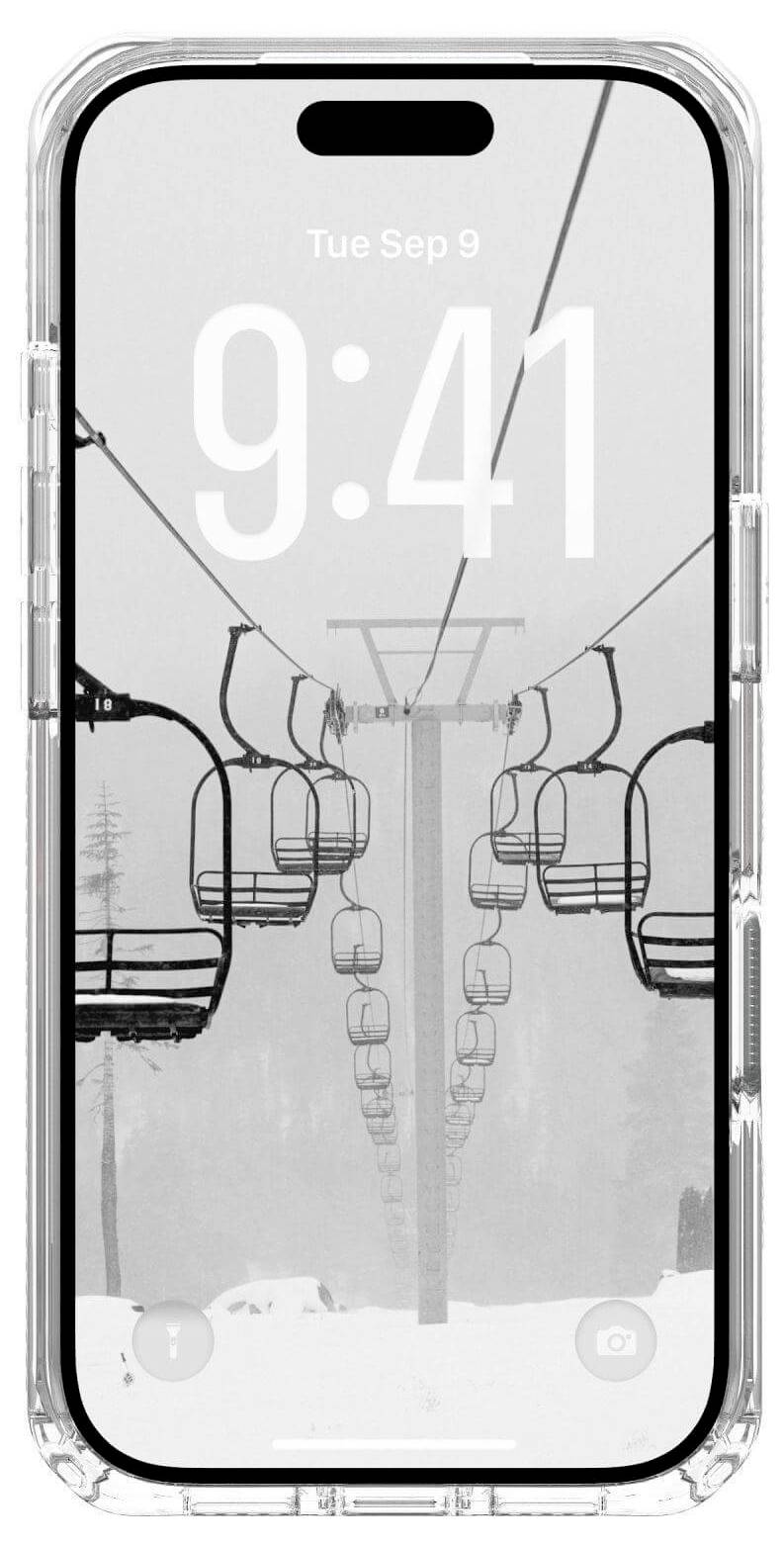 Ekran telefonu wyświetlający czarno-białe zdjęcie pustych krzeseł wyciągu narciarskiego w śnieżny, mglisty dzień, pokazujący godzinę 9:41.