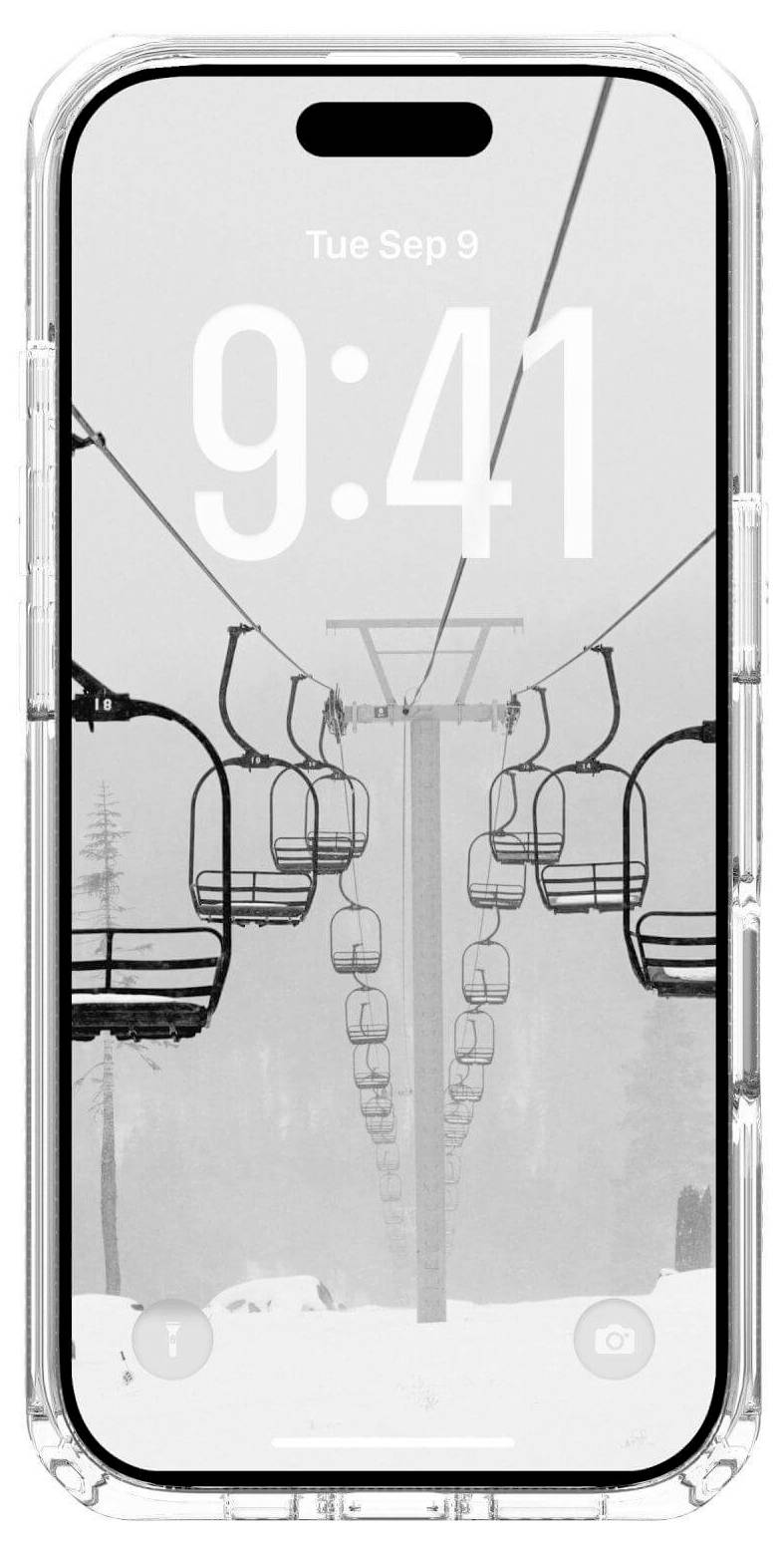 Smartfon wyświetlający czarno-białe zdjęcie pustego wyciągu narciarskiego na ekranie blokady, z godziną '9:41' i datą 'Wt 9 wrz'.