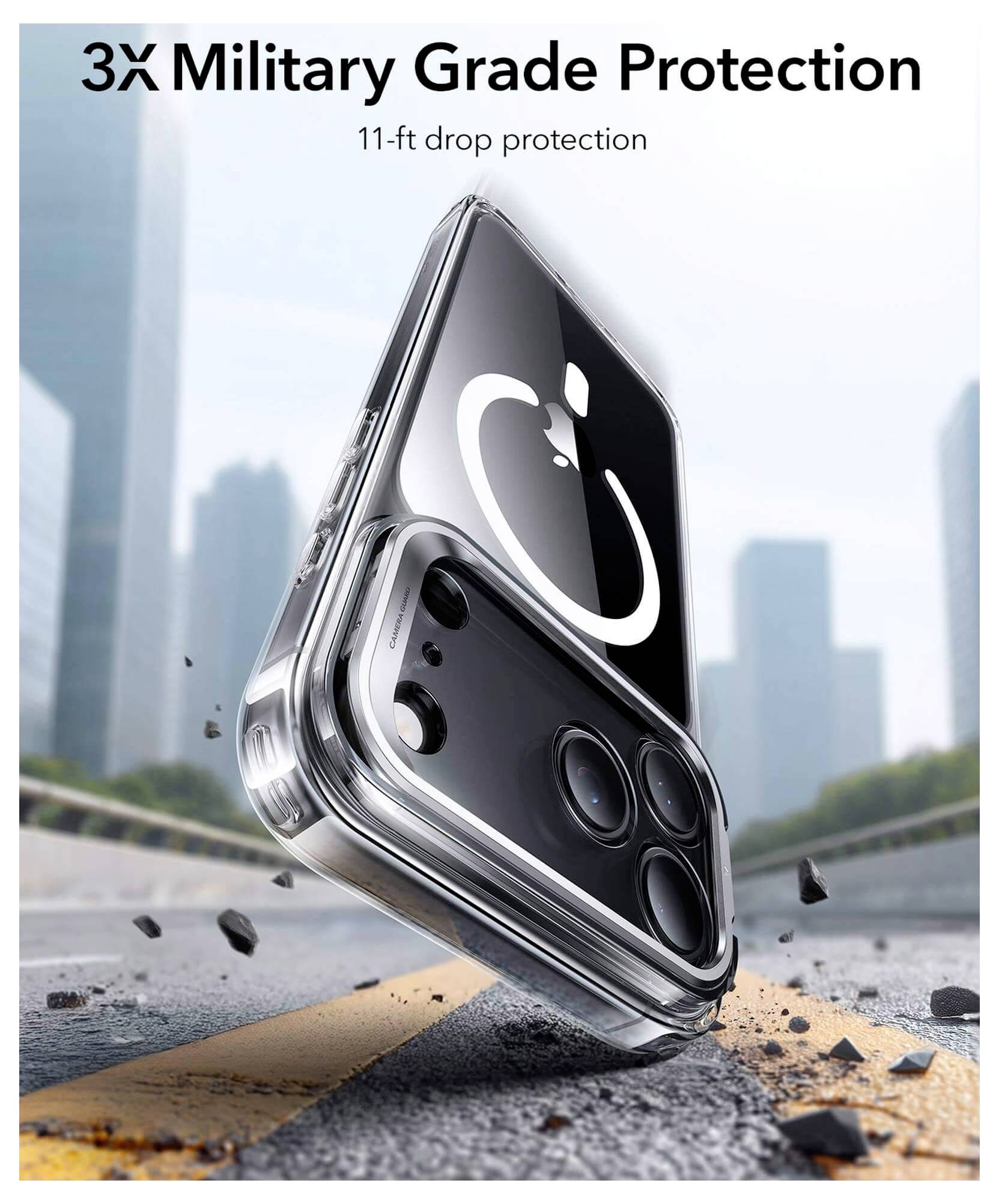 Etui na telefon z napisem '3-krotna ochrona wojskowa', przedstawiające telefon spadający na drogę z odłamkami. W tle rozmyte wieżowce.