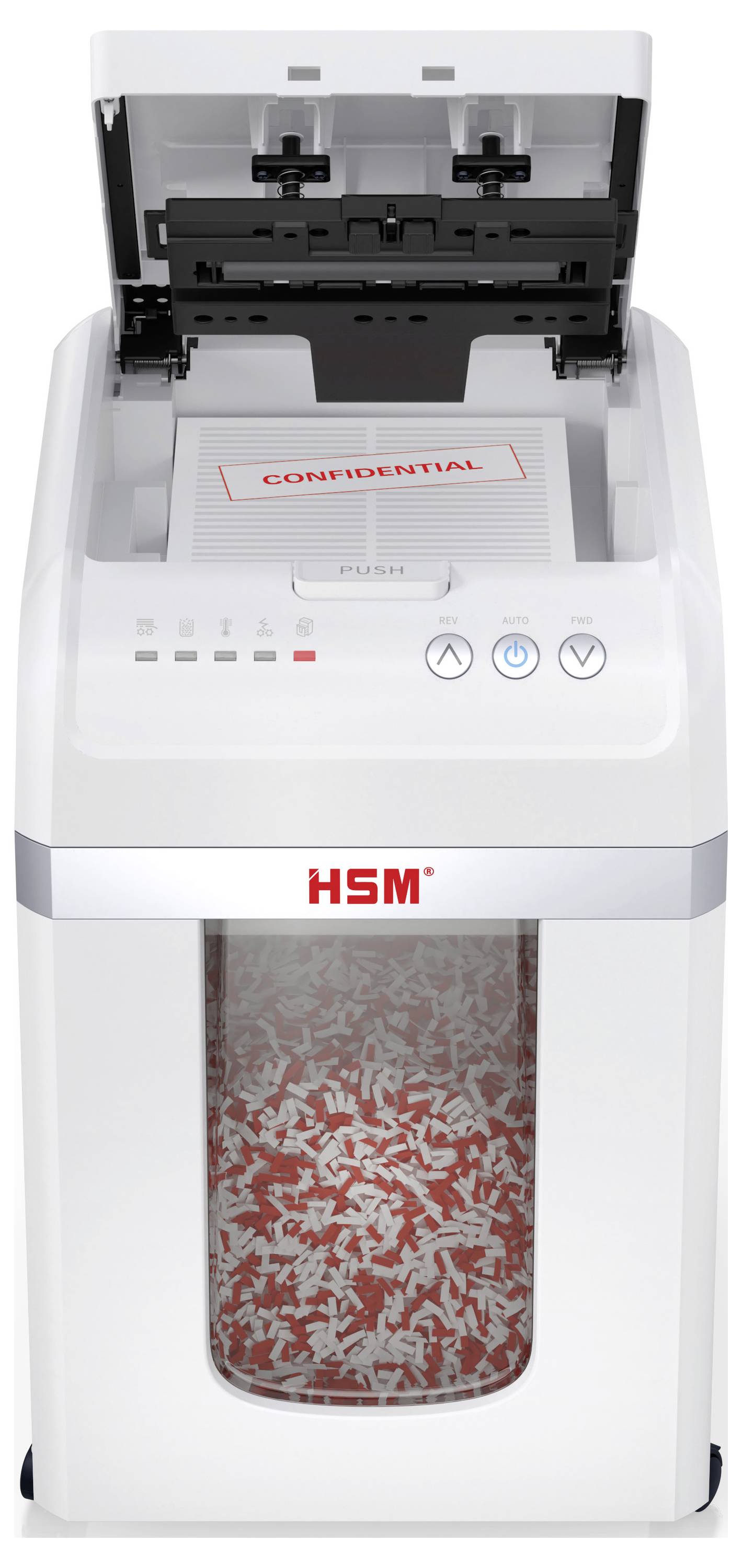 Niszczarka z otwartą pokrywą niszczy kartkę oznaczoną jako „POUFNE". Kosz jest wypełniony paskami podartego papieru.
