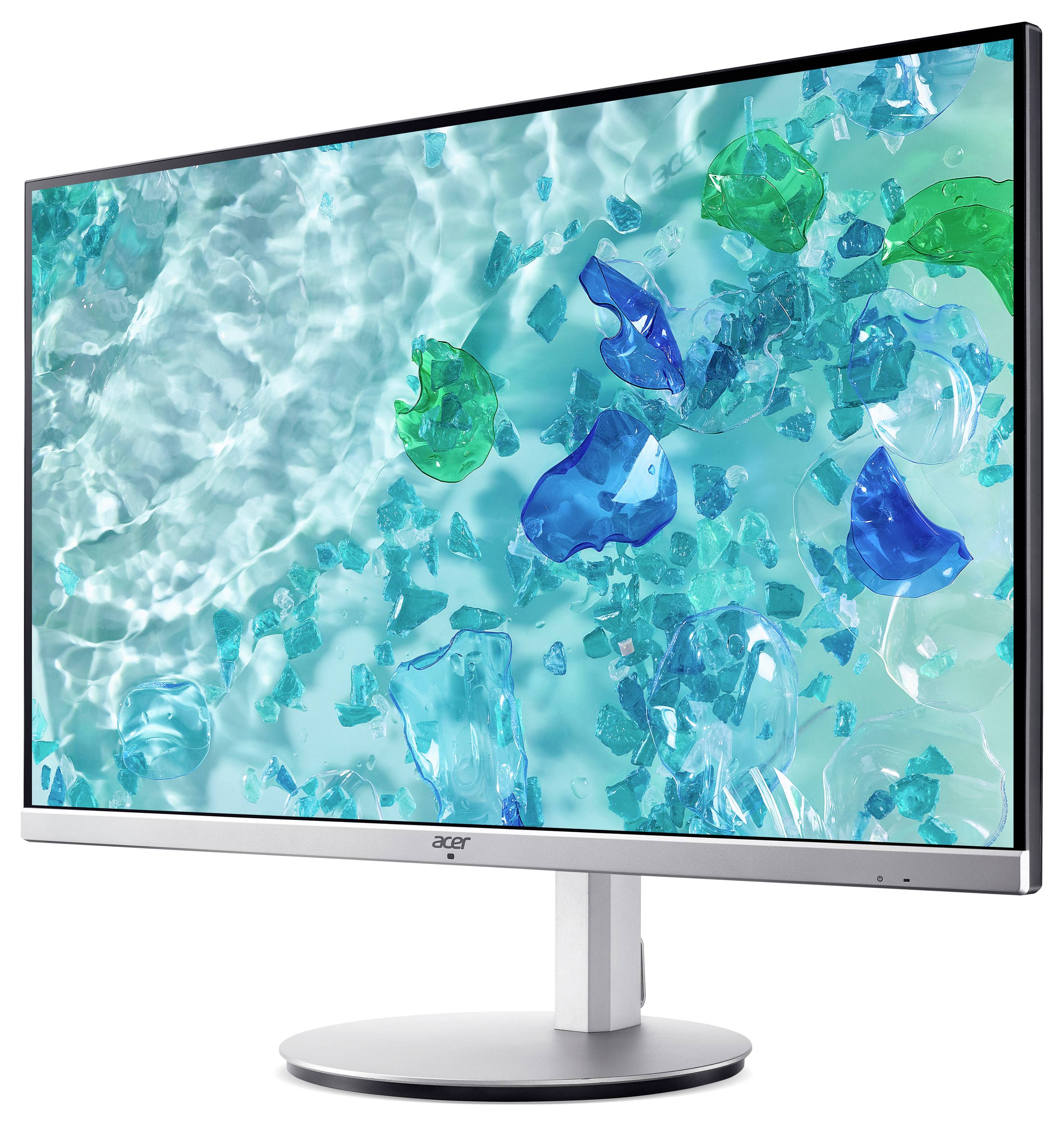 Monitor Acer z bezkrawędziową konstrukcją wyświetla żywy obraz unosząych się niebieskich i zielonych obiektów w wodzie, podkreślając ostrość i nasycenie kolorów.