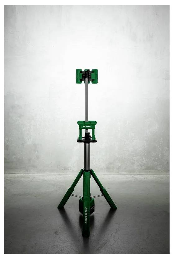 Zamocowany na statywie zielony przyrząd stoi na pustym tle, posiadający solidną podstawę i wysuwany słup do podparcia.